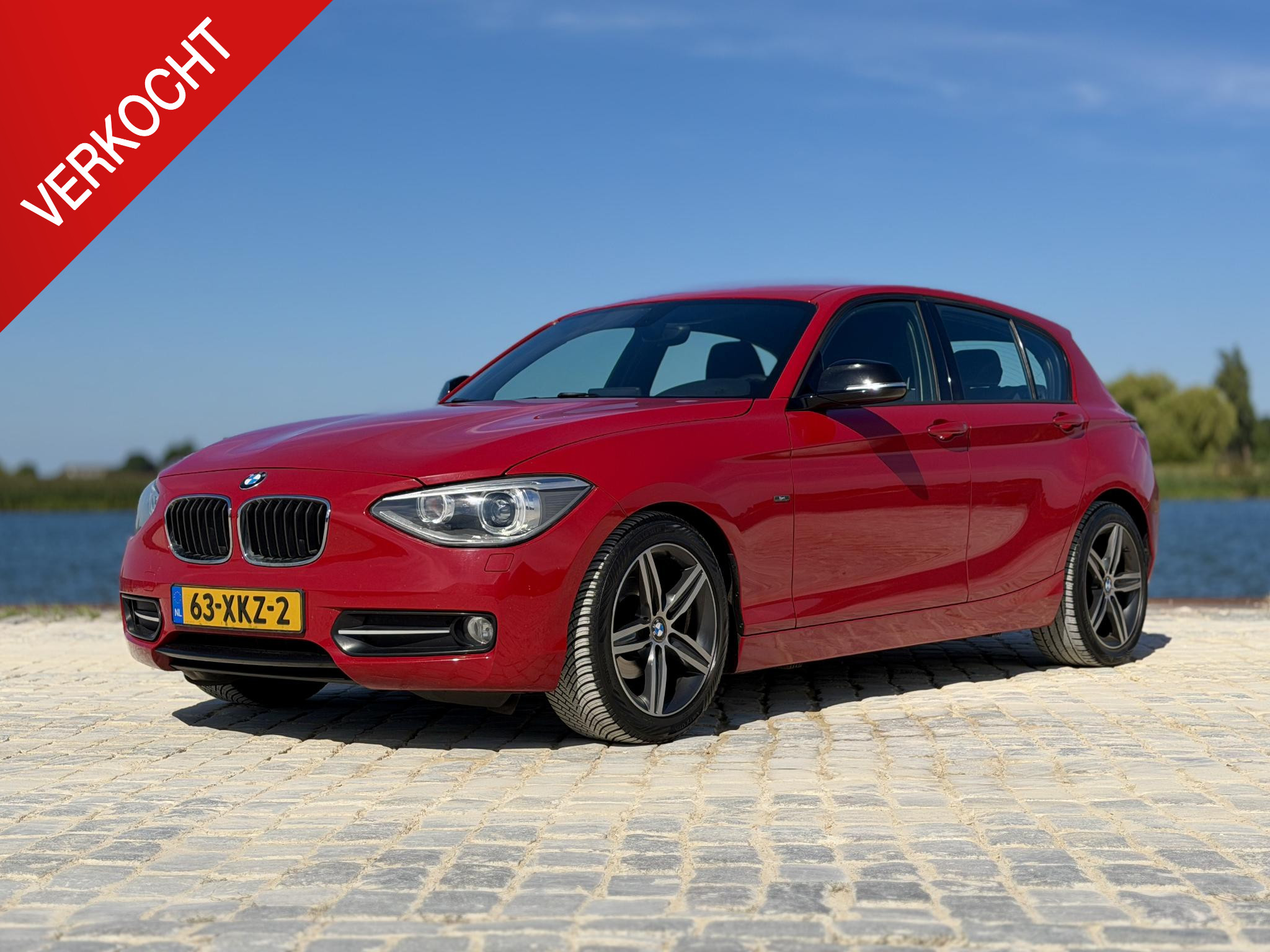BMW 1er Reihe 116i Business|Navi|PDC|Cruise|Sport|LM 17" 2012 - voorkant