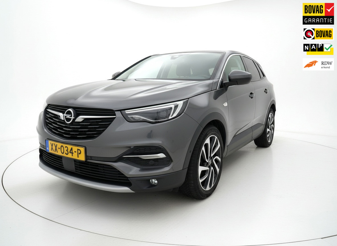 Opel Grandland X 1.2 Turbo Innovation|Pano|Trekhaak|Camera|Stoelverw.|Stoelverkoeling|Stuurverwarming|Nap|Distributieriem al gedaa 2019 - voorkant