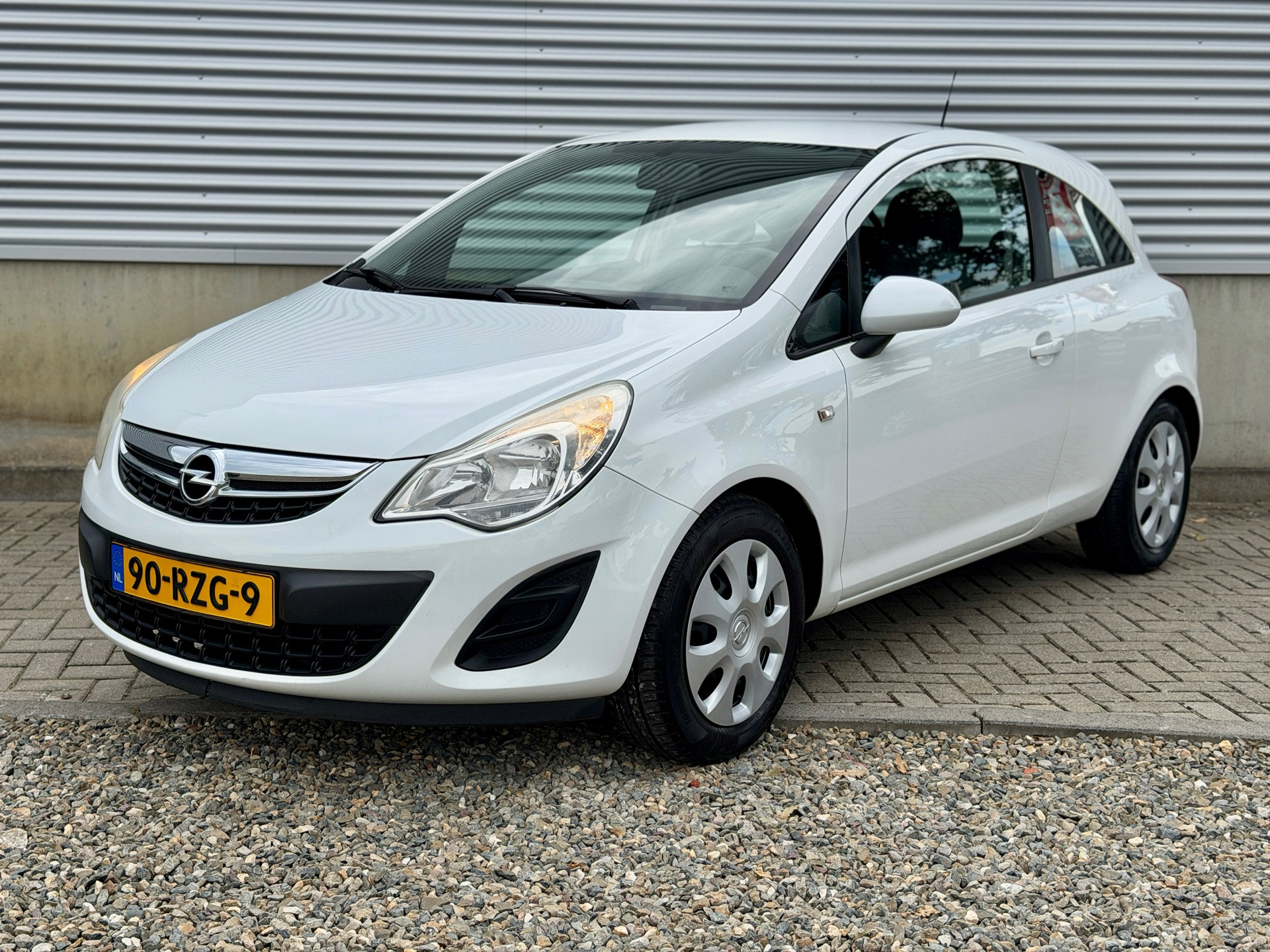 Opel Corsa 1.0-12V Edition [ 2e eig. Fm navi,airco,audio,cruise ] 2011 - voorkant