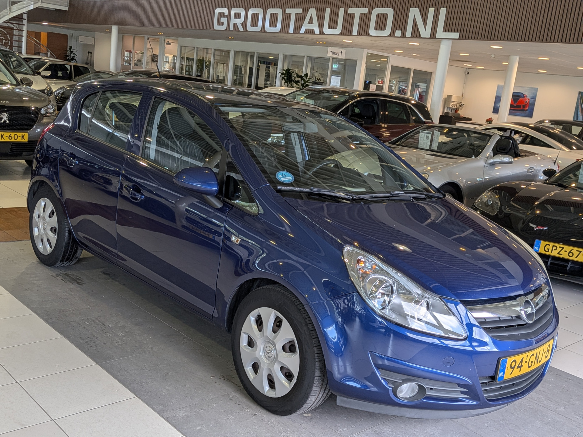 Opel Corsa 1.4-16V Enjoy 2008 - voorkant