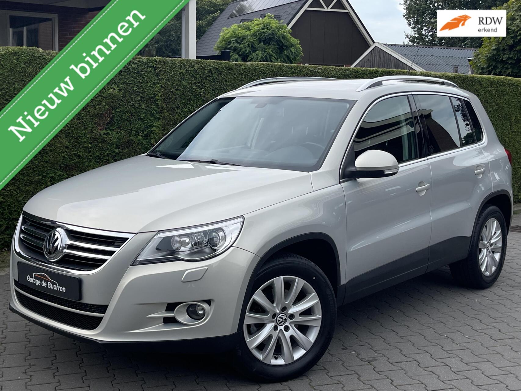 Volkswagen Tiguan 1.4 TSI Sport&Style | 18 INCH SPORTVELGEN | STOELVERWARMING | PARKEERSENSOREN ACHTER 2010 - voorkant