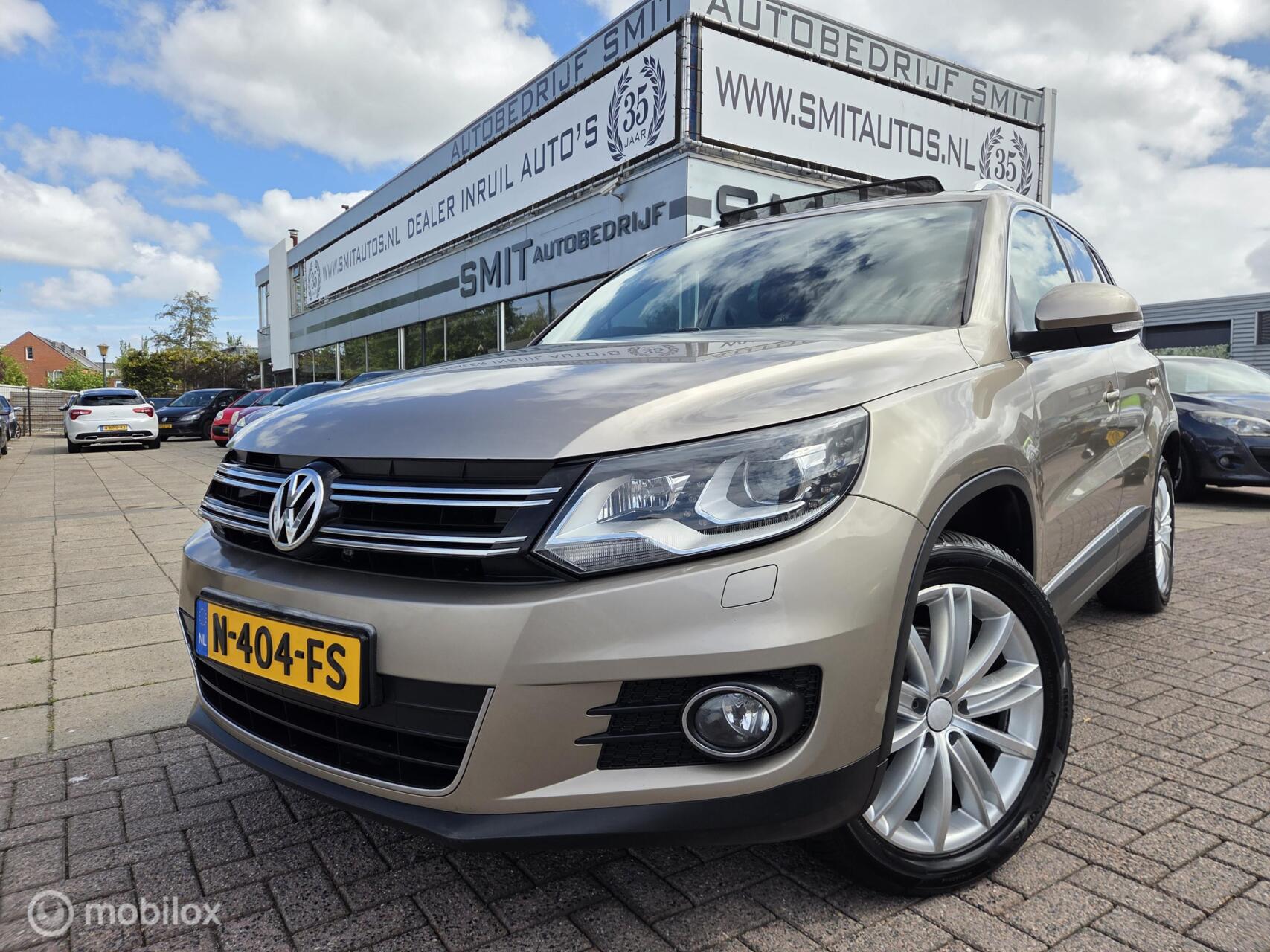 Volkswagen Tiguan 2.0 TSI 4motion R-line Aut/Pano/Trekhaak 2013 - voorkant