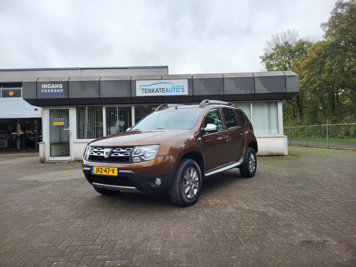 Dacia Duster 1.2 TCe 4x2 Prestige Airco Cruise control Navi Lichtmetaal Leder 2014 - voorkant