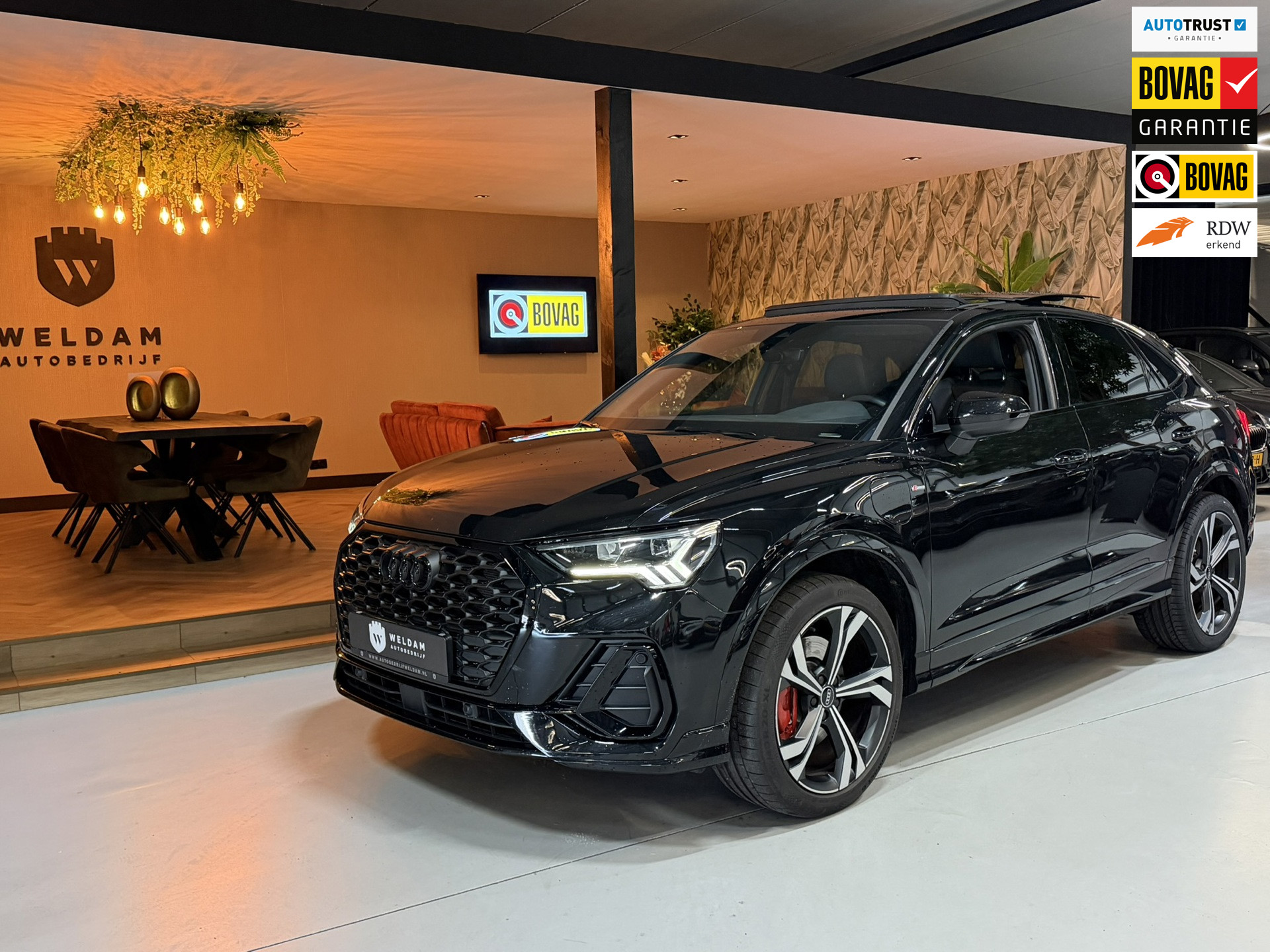 Audi Q3 Sportback E-tron 45 TFSI e S Edition|245pk|Plug-in Hybrid|Zwart|Adaptieve Cruise|Pano|Matrix LED|Blindspot|Keyless|Rijklaar 2024 - voorkant