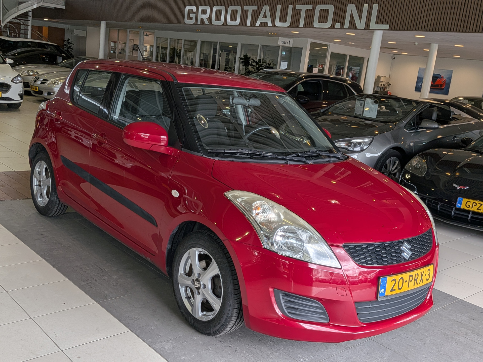 Suzuki Swift 1.2 Comfort EASSS 2011 - voorkant