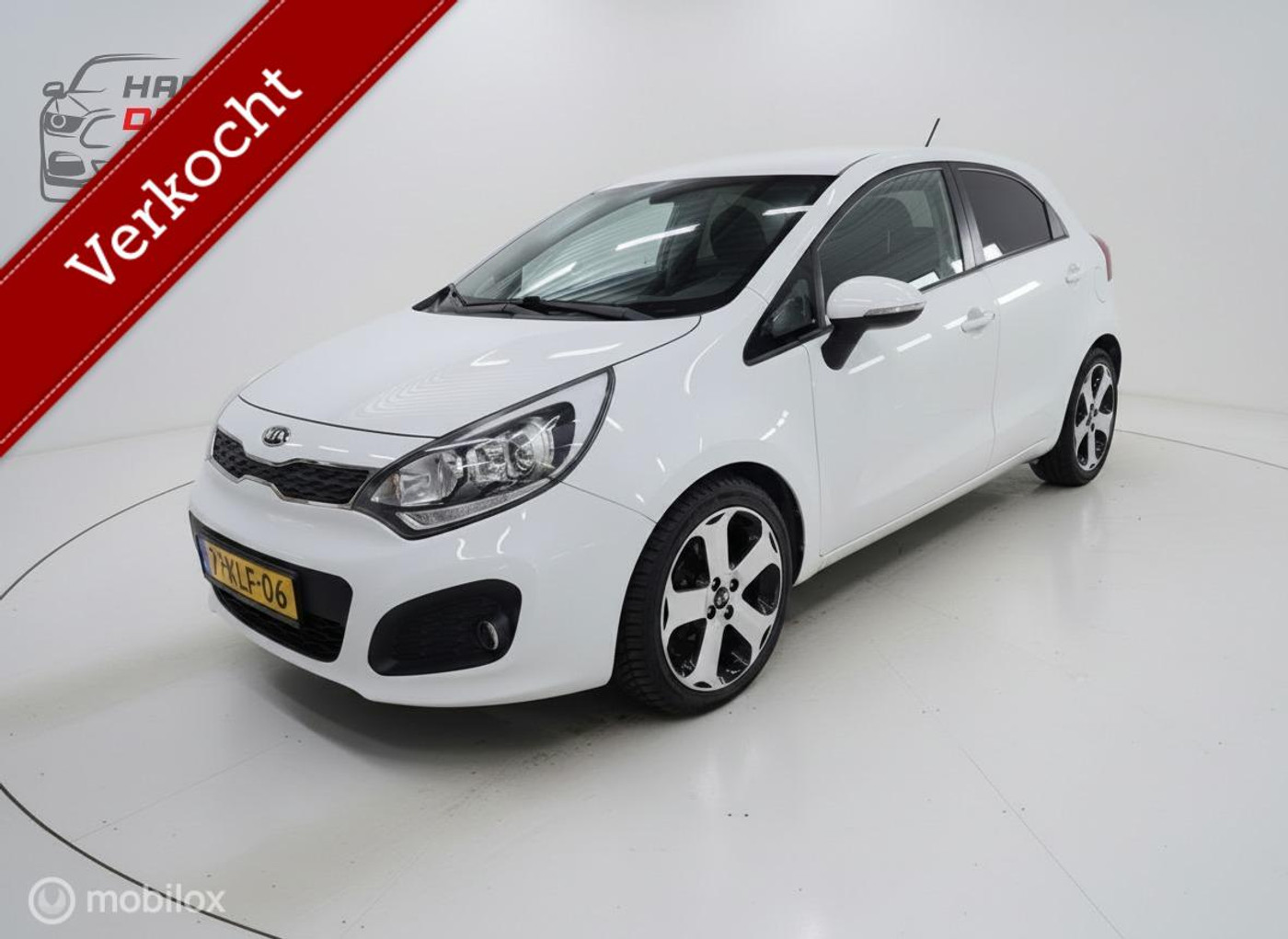 Kia Rio 1.2 CVVT Super Pack/Cruise/Clima/Keyless/Pdc/Navi 2013 - voorkant