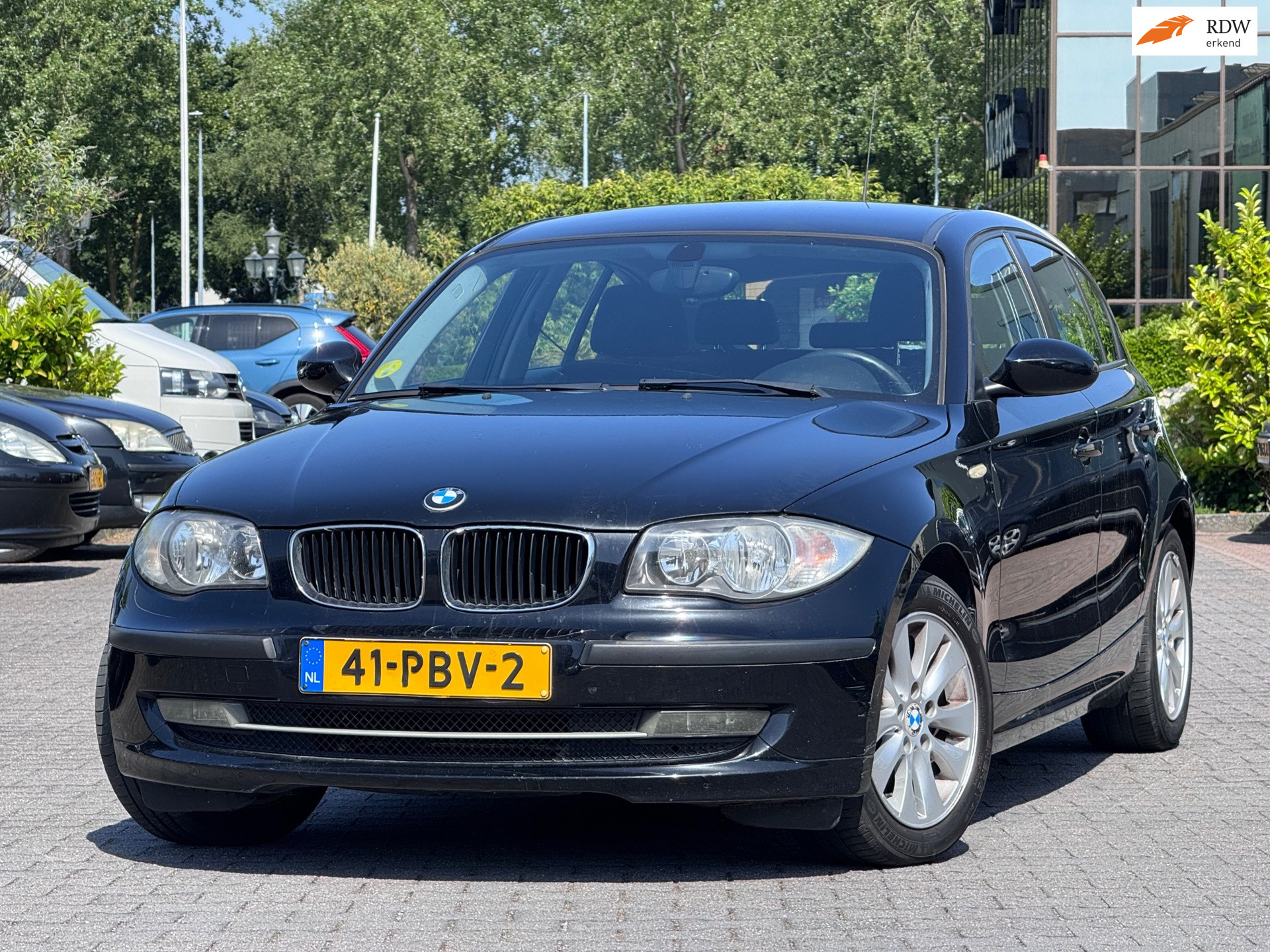 BMW 1er Reihe 116i | Stoelverwarming | Airco | Elektrische ramen en spiegels 2007 - voorkant