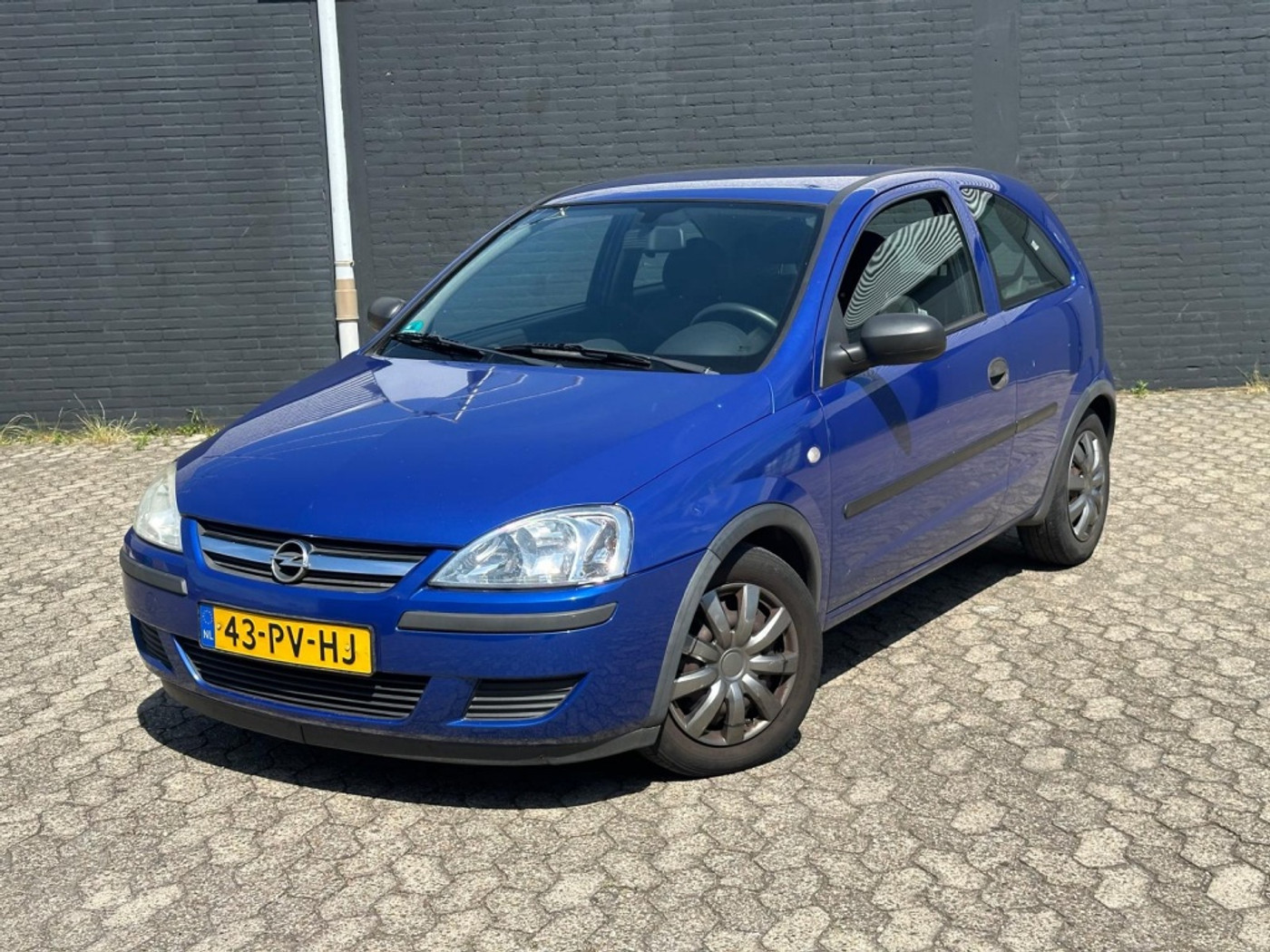 Opel Corsa-c 1.2-16V Rhythm, APK 13-04-2027 2004 - voorkant