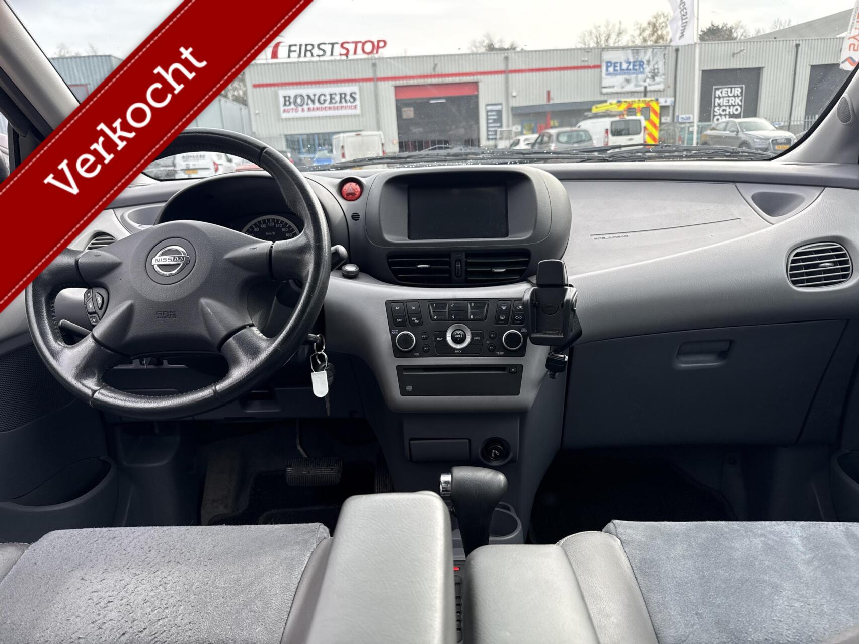 Foto van Nissan Almera Tino