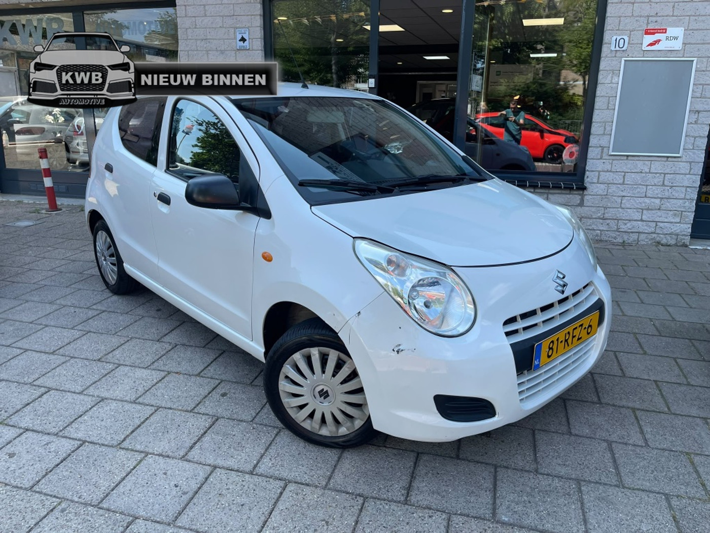 Suzuki Alto 1.0 Base 5Drs Nieuwe apk Parelmoer Wit 2010 - voorkant