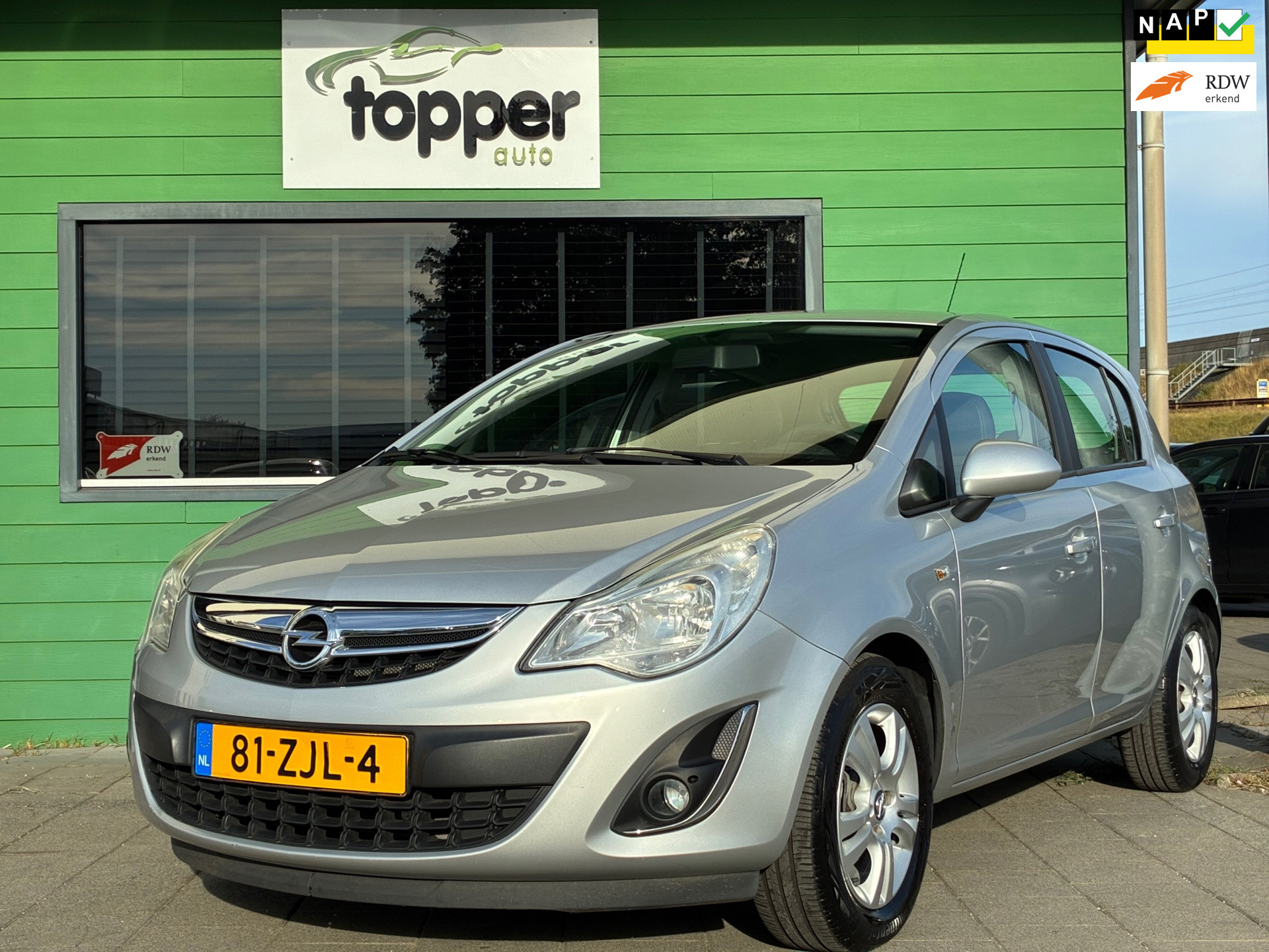 Opel Corsa 1.4-16V Anniversary Edition|1e Eigenaar|CruiseControl|Trekhaak|Airco|PDC|Elektr.ramen|NAP| 2012 - voorkant