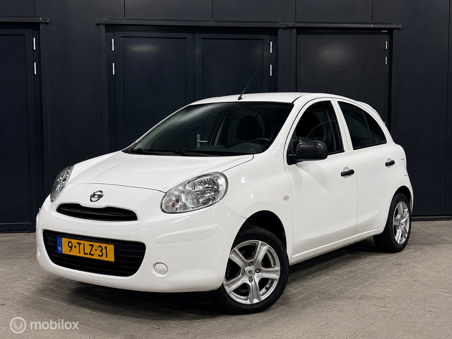 Nissan Nissan Micra 1.2 Visia Pack airco/nieuwe apk/lm velgen 2011 - voorkant