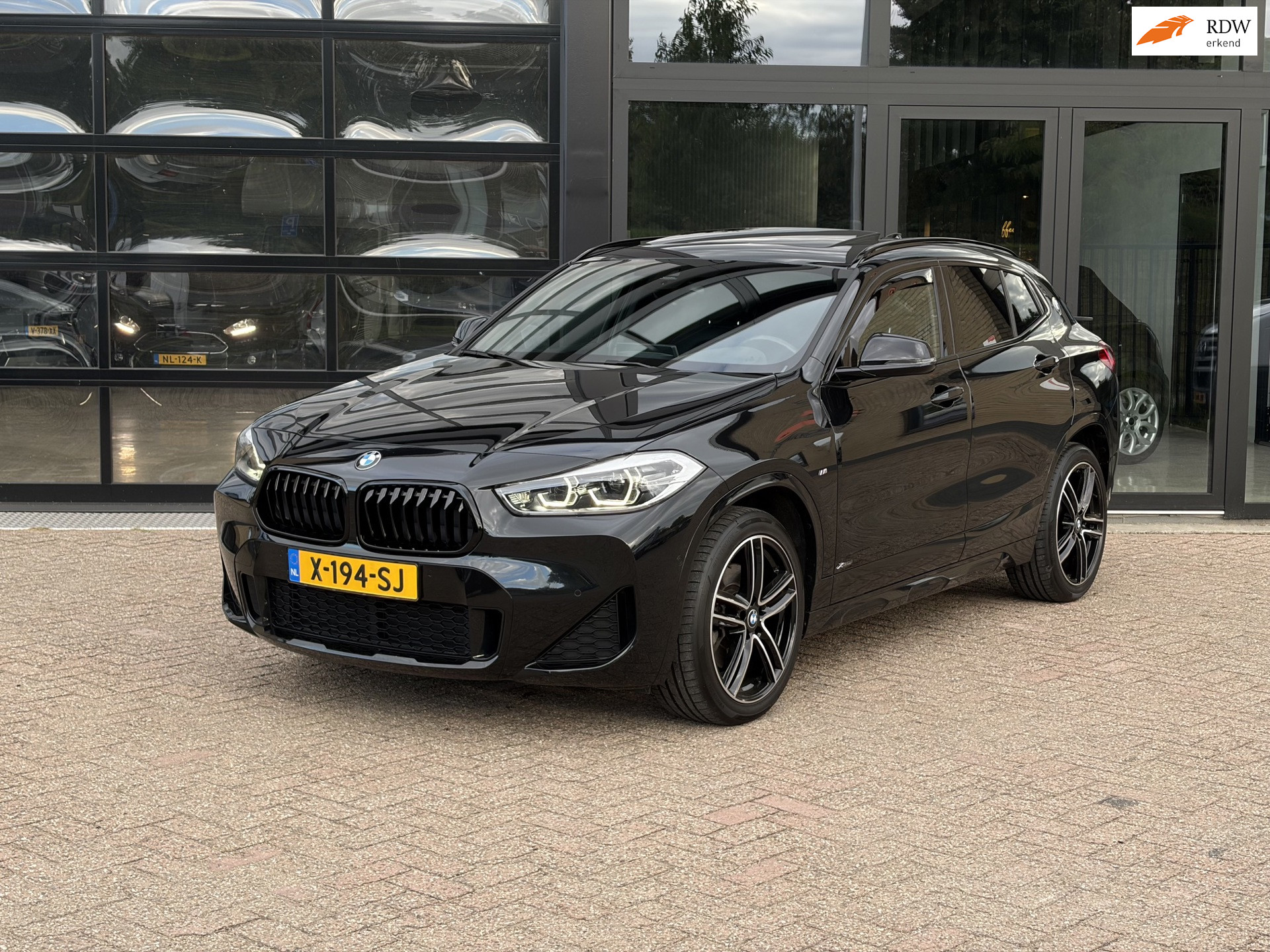 BMW X2 Xdrive20i XDrive20i High Executive - M Sport - Full option 2023 - voorkant