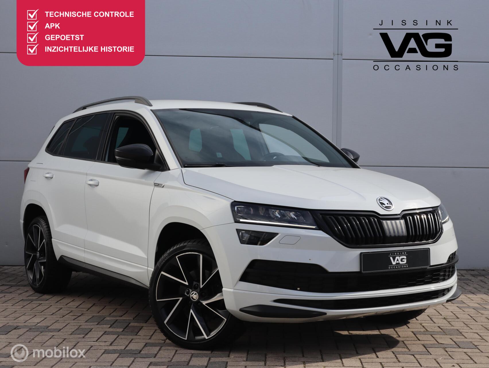 Skoda Karoq 1.5 TSI Sportline Orig.NL|Aut|Trekhaak|Carplay|ACC 2021 - voorkant