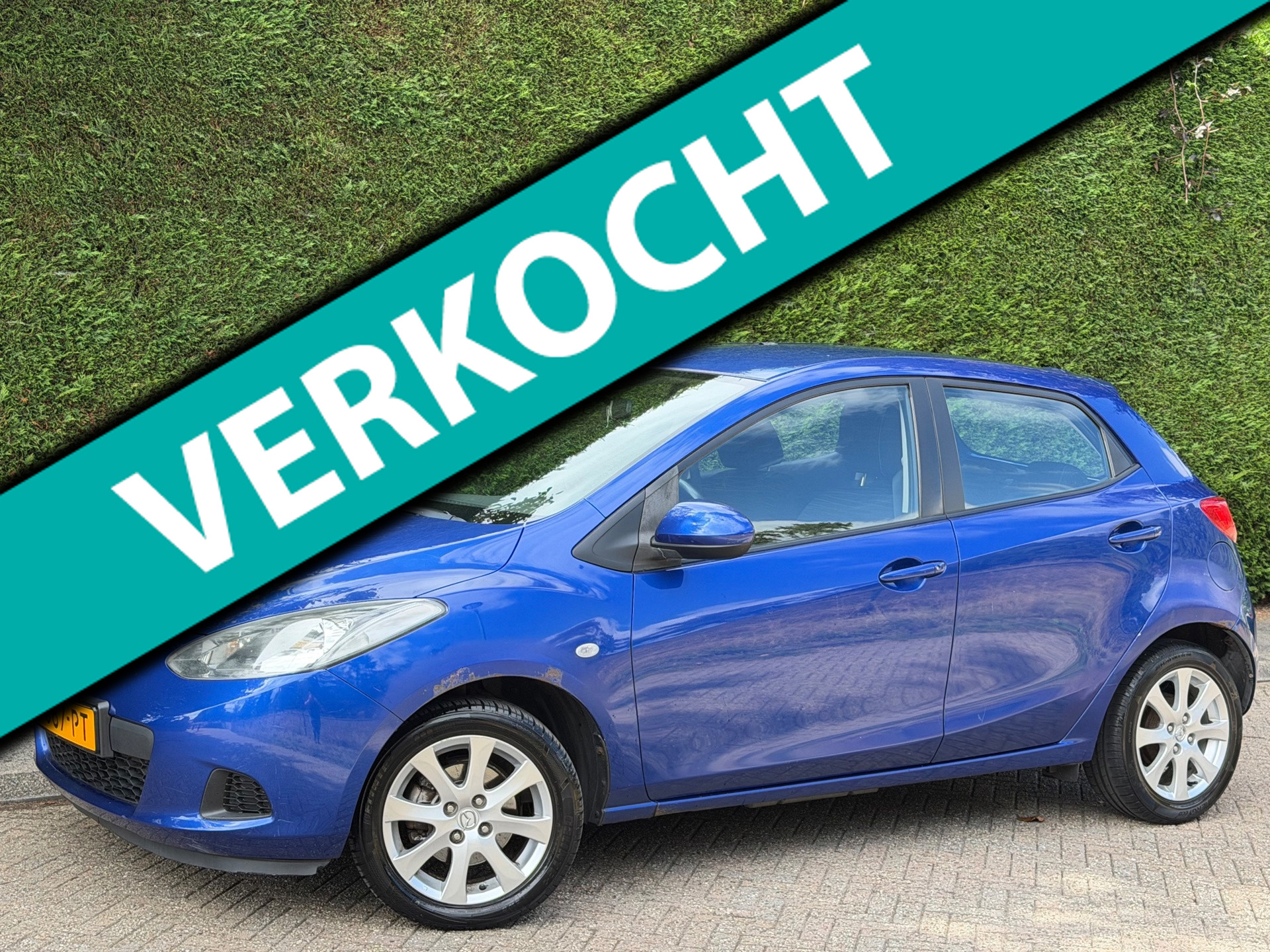 Mazda Mazda 2 1.3hp S-VT Touring RIJDSUPER!/AIRCO/5DRS/APK 12-26! 2007 - voorkant