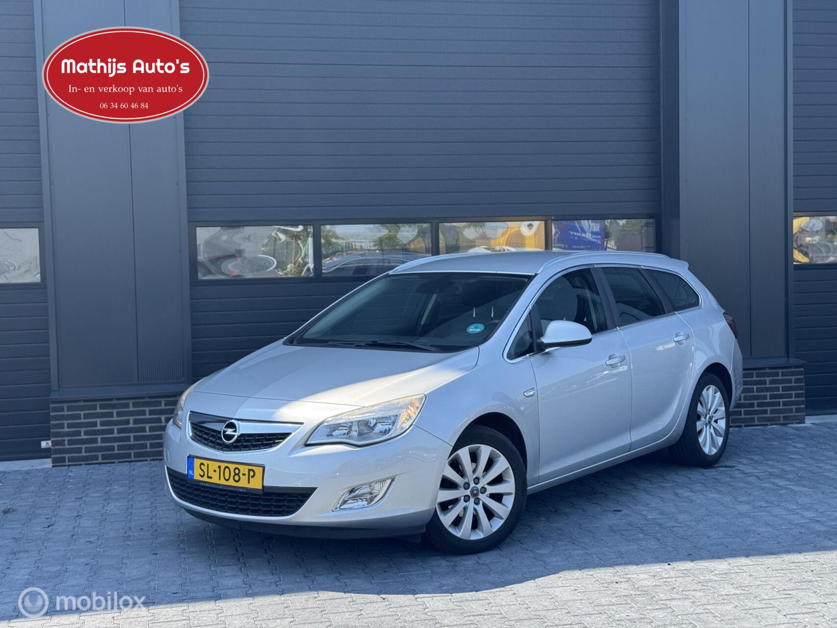 Opel Astra Sports Tourer 1.4 Turbo Sport Airco Nette staat! Goed onderhouden! 2013 - voorkant