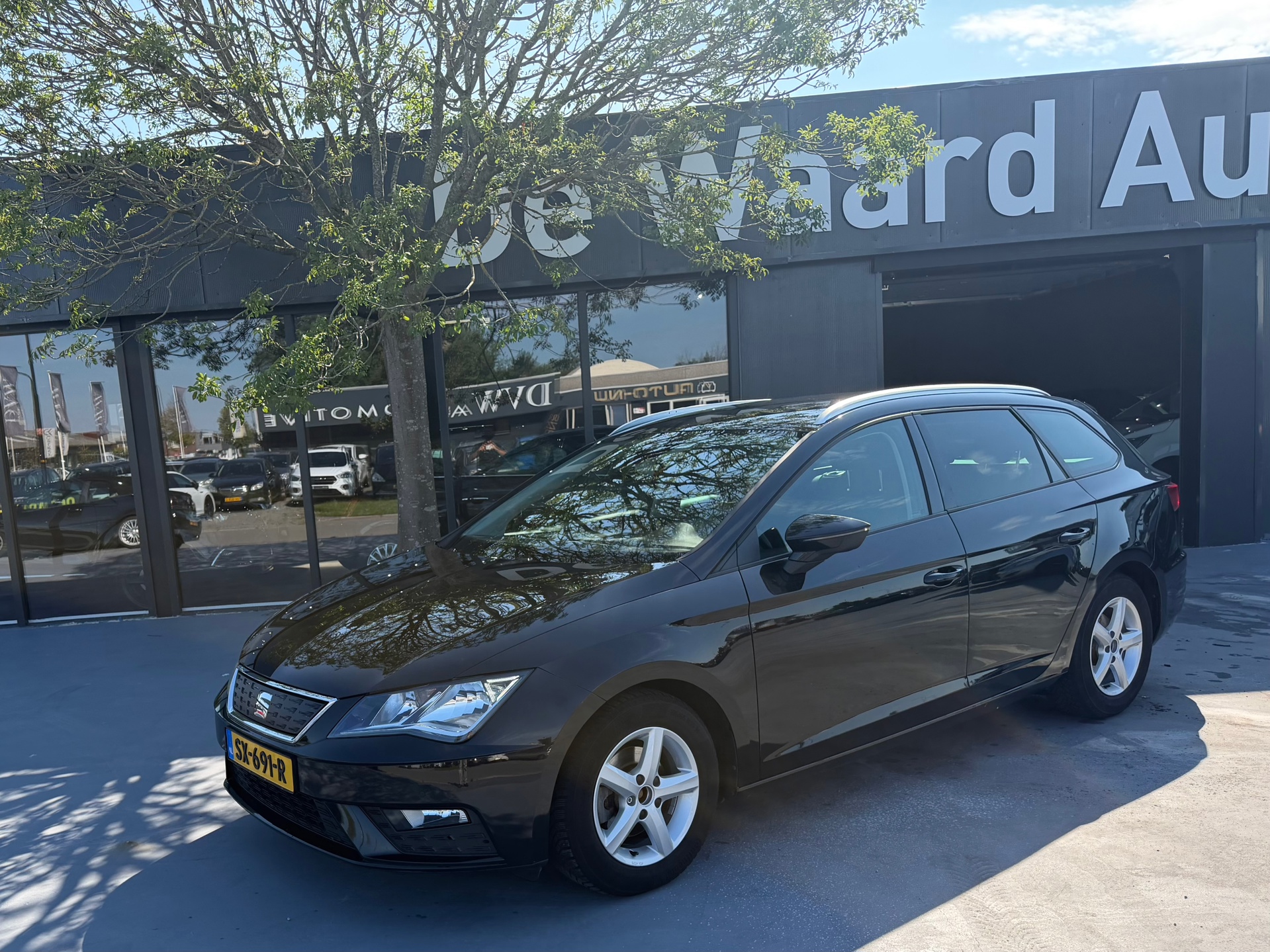 Seat Leon ST 1.0 EcoTSI Style Business Intense/ airco/cruise/Navi/PDC achter/NAP/1e eigenaar/12 maanden garantie 2018 - voorkant