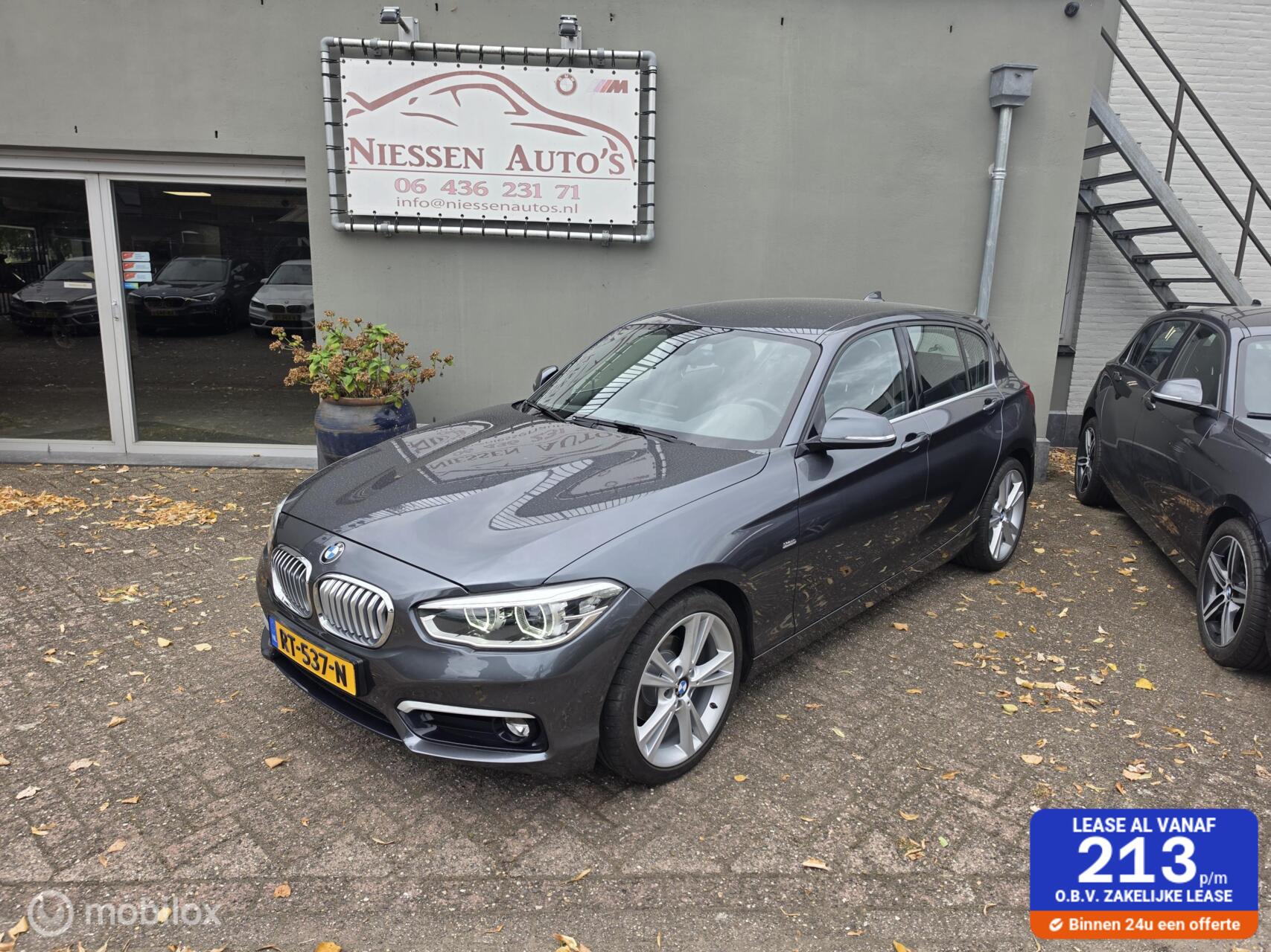 BMW 118i F20 118i Executive Led/Urban/Navi/1ste eigenaar 2018 - voorkant
