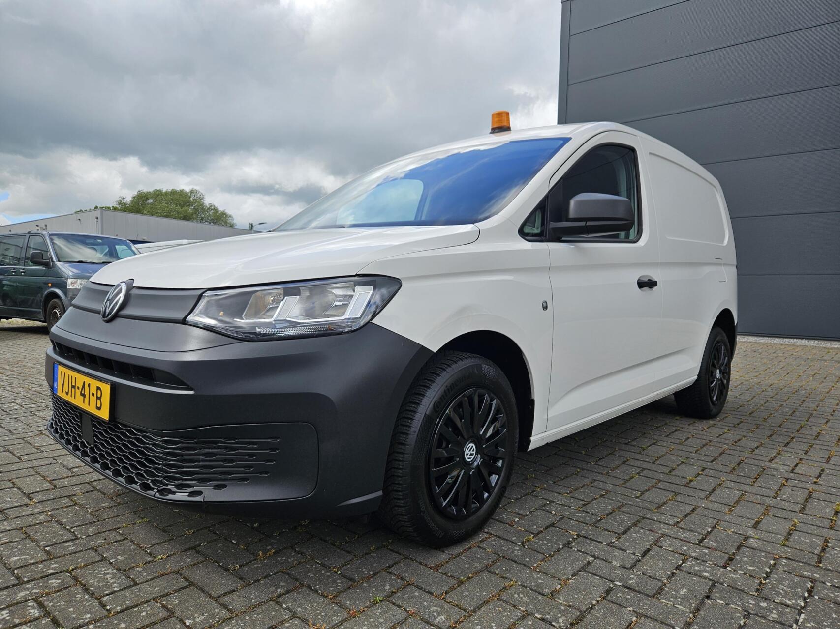 Foto van Volkswagen Caddy Modified Partition Wall