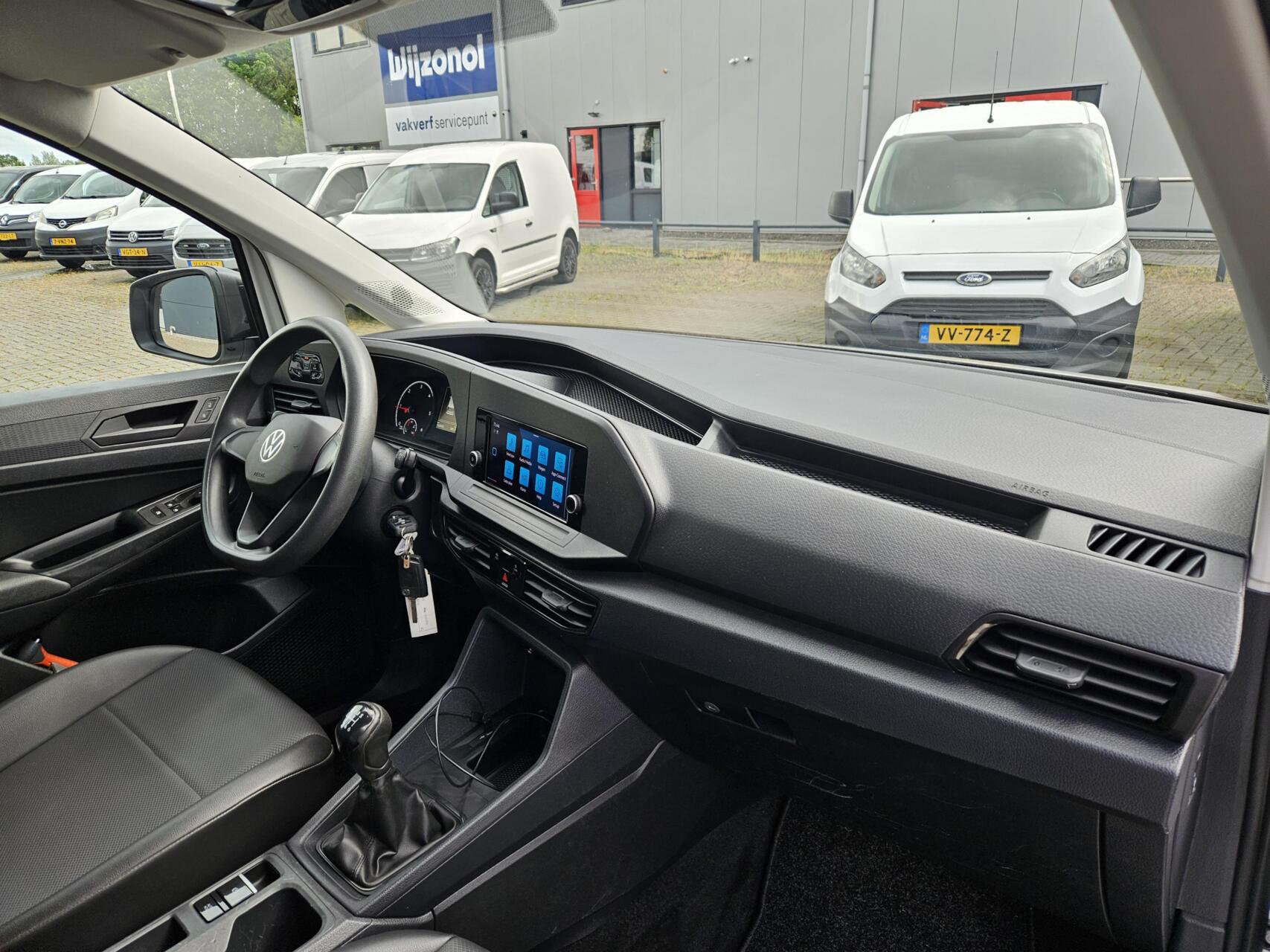 Foto van Volkswagen Caddy Modified Partition Wall