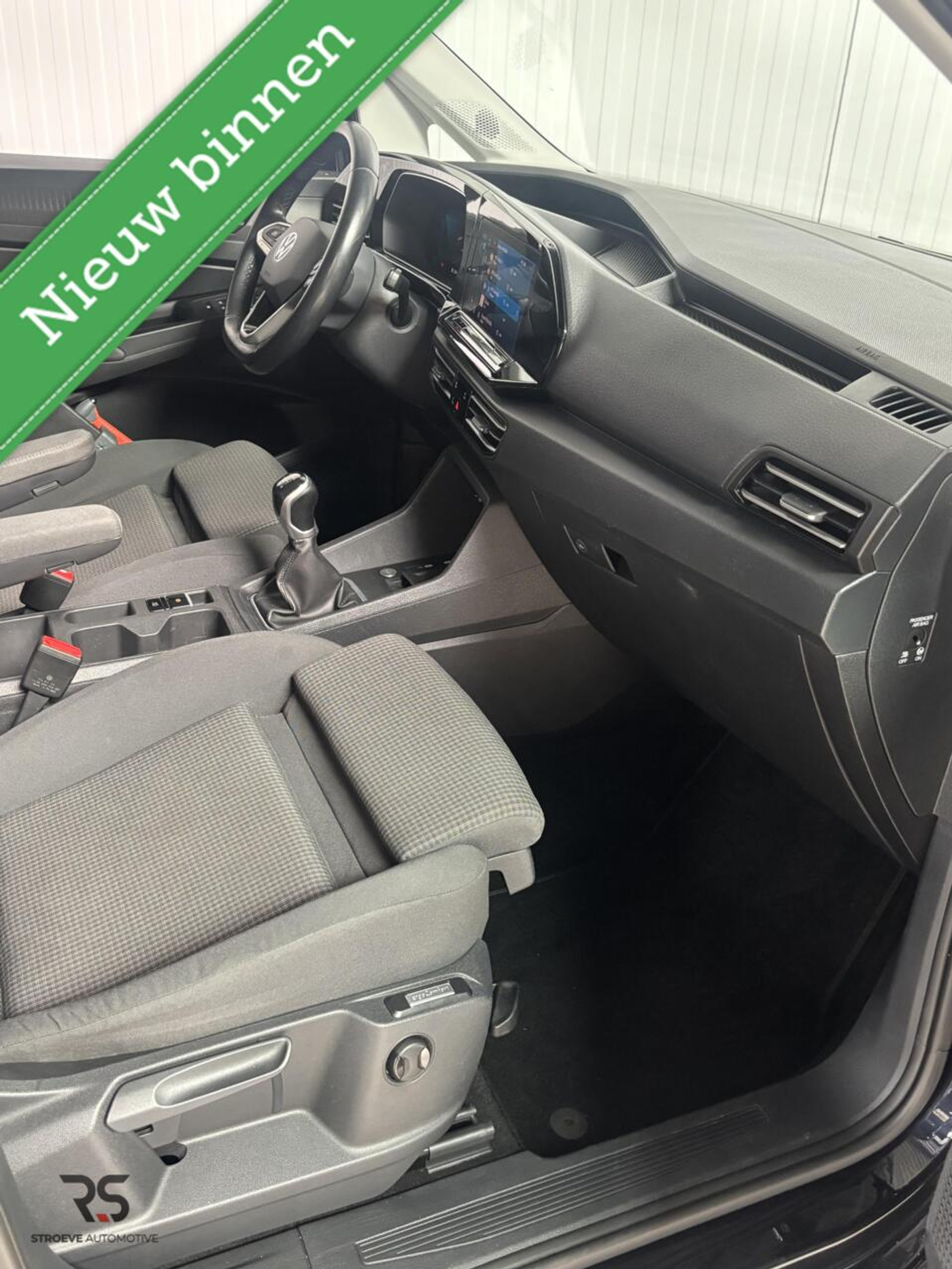 Foto van Volkswagen Caddy Modified Partition Wall