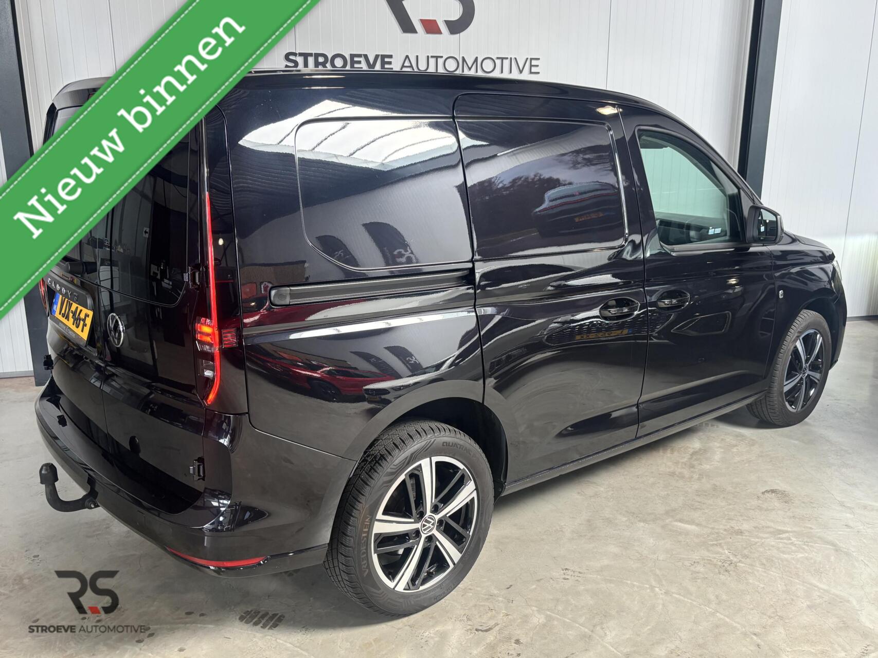 Foto van Volkswagen Caddy Modified Partition Wall