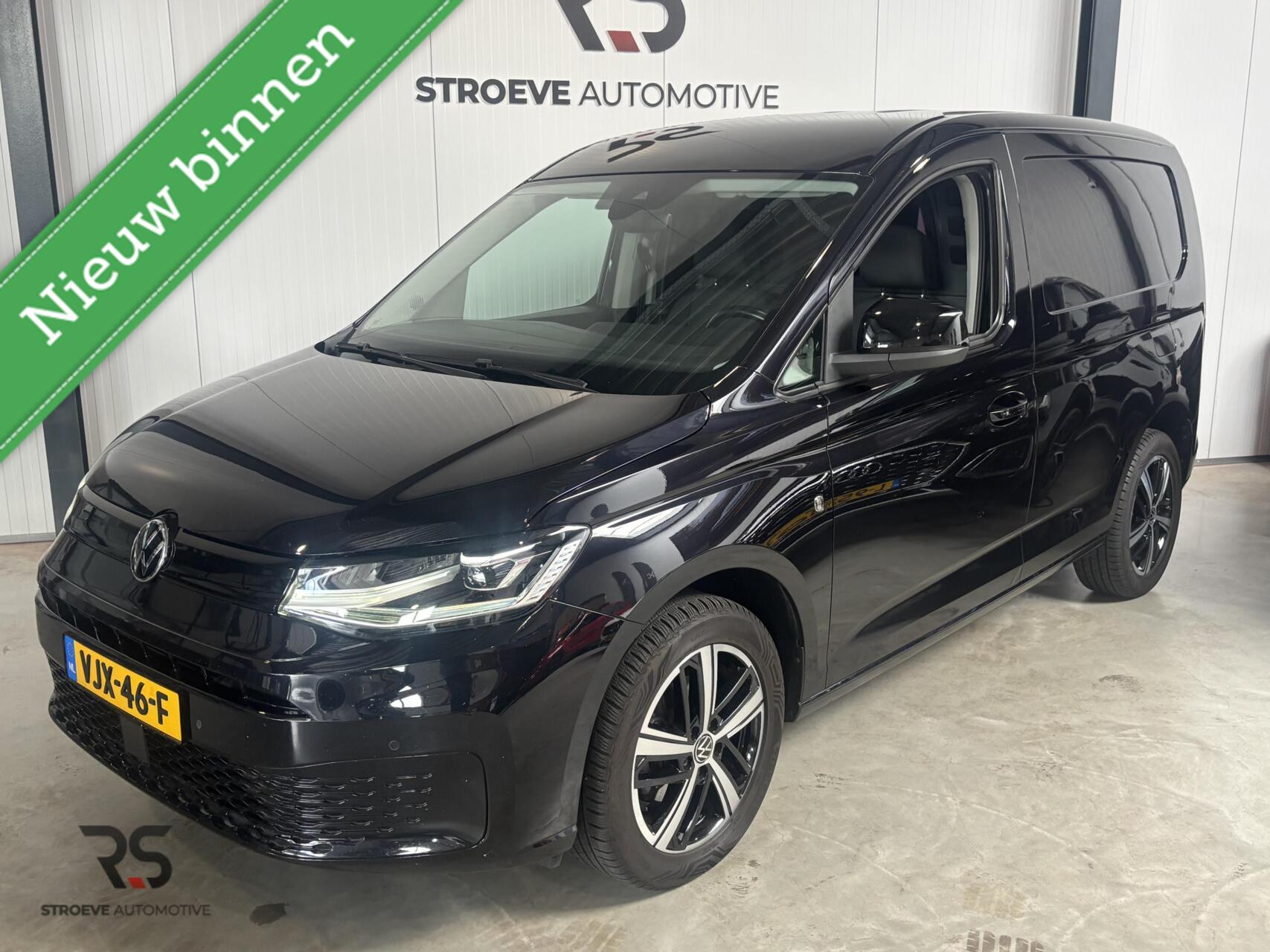 Foto van Volkswagen Caddy Modified Partition Wall