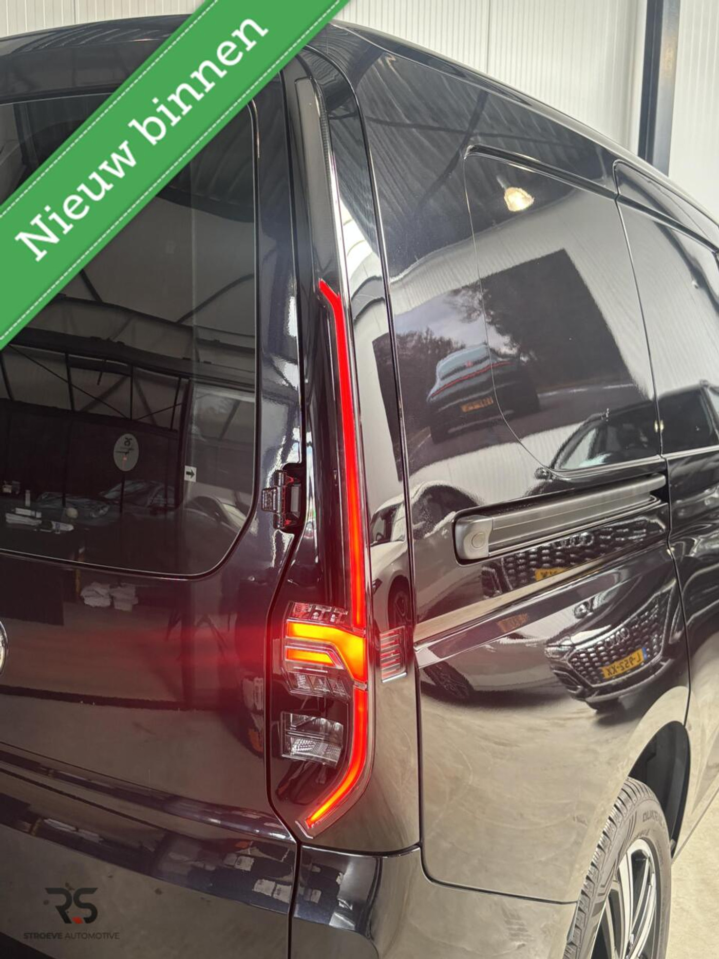 Foto van Volkswagen Caddy Modified Partition Wall