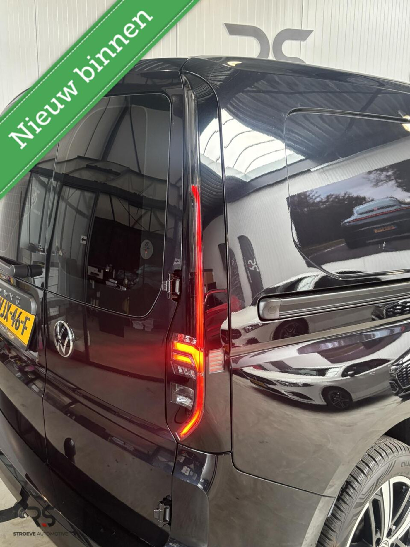 Foto van Volkswagen Caddy Modified Partition Wall