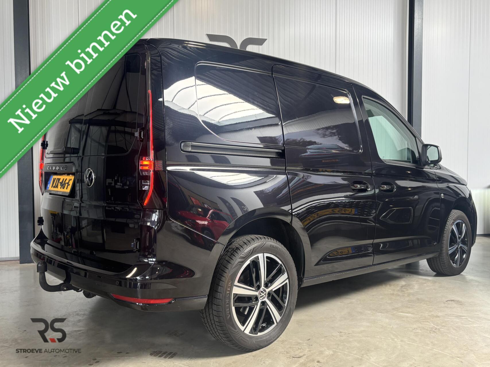 Foto van Volkswagen Caddy Modified Partition Wall