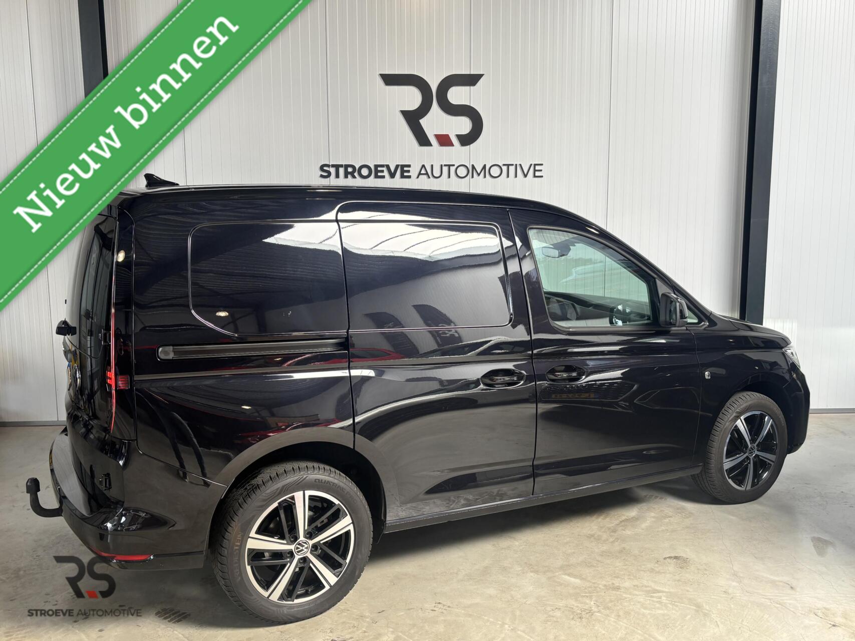 Foto van Volkswagen Caddy Modified Partition Wall