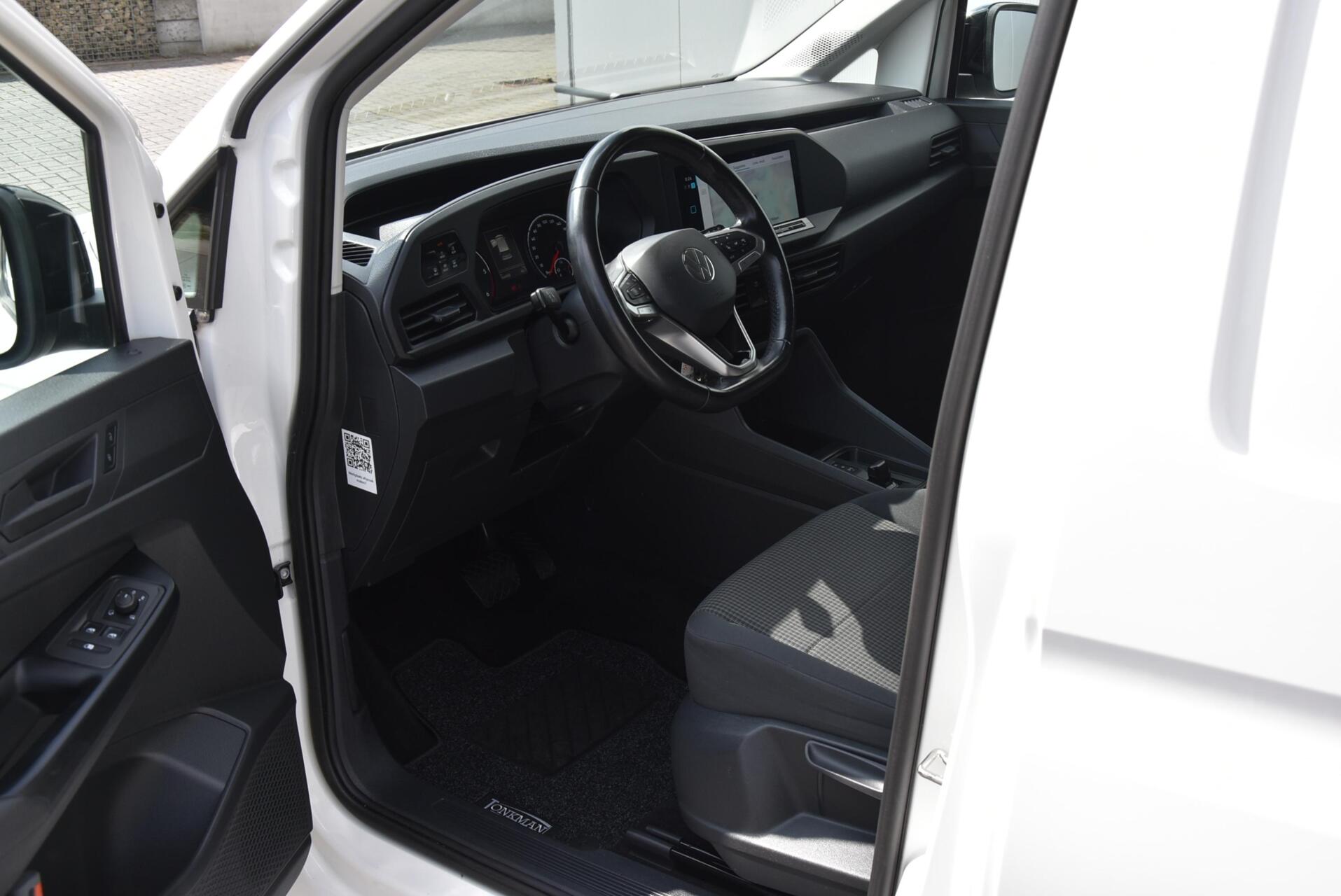 Foto van Volkswagen Caddy Modified Partition Wall