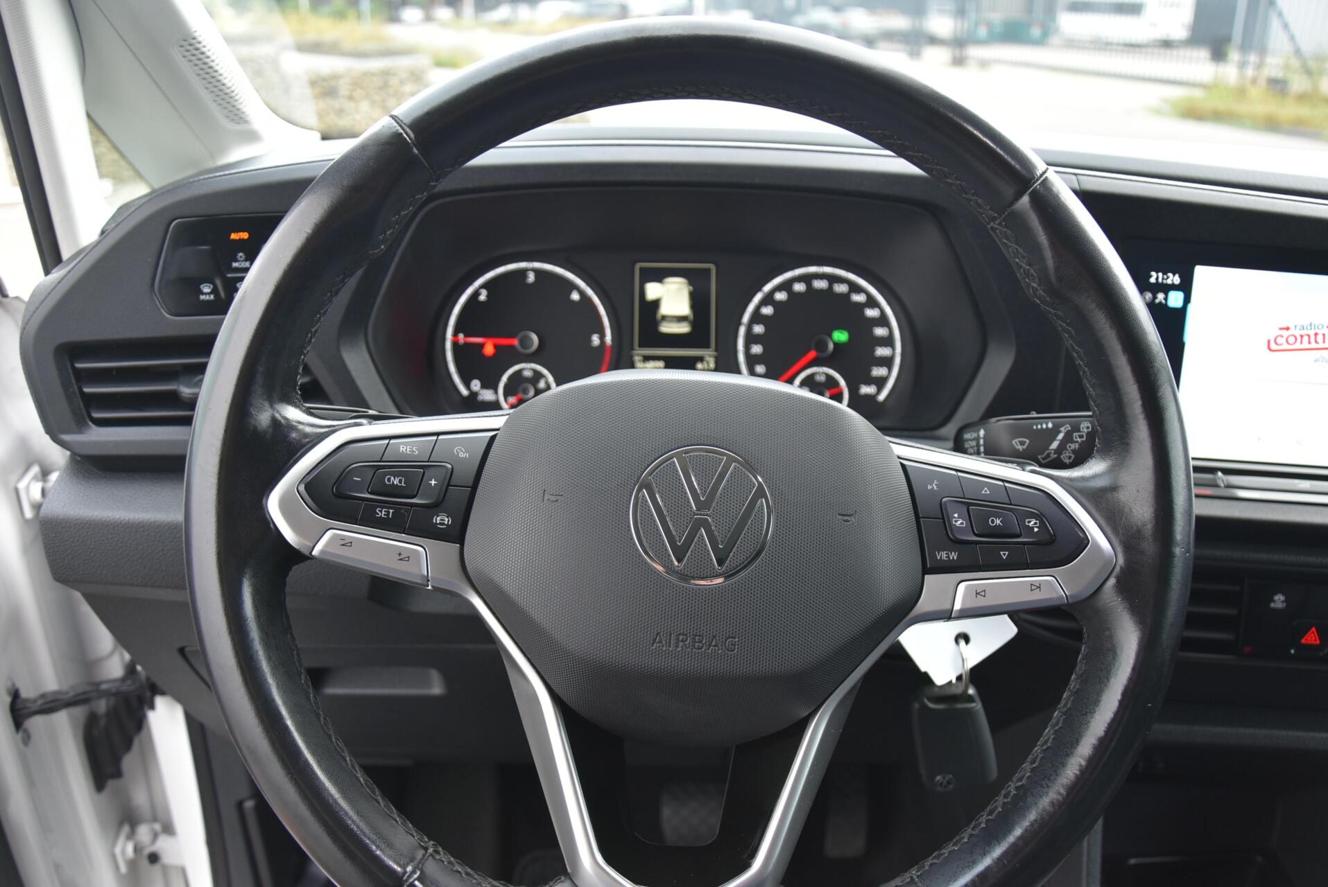 Foto van Volkswagen Caddy Modified Partition Wall