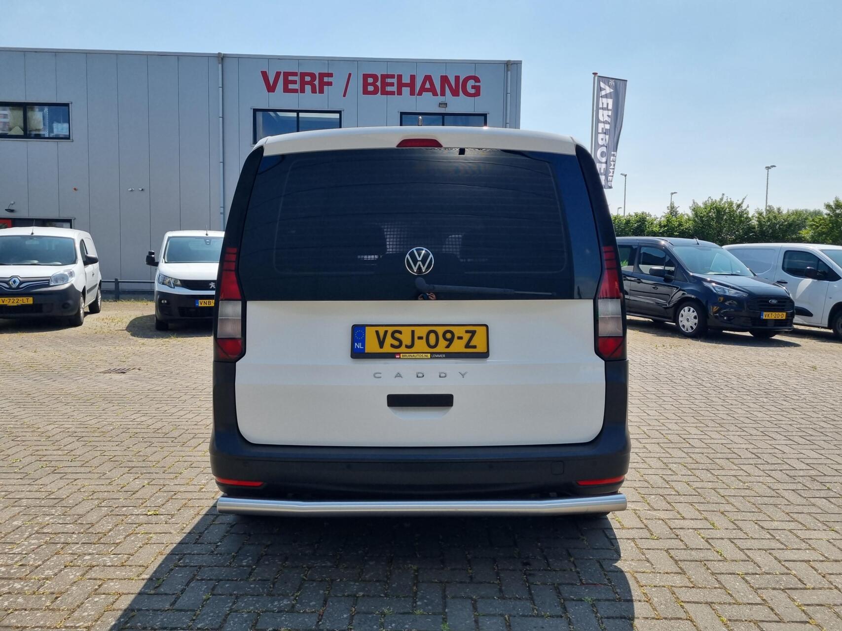 Foto van Volkswagen Caddy Modified Partition Wall