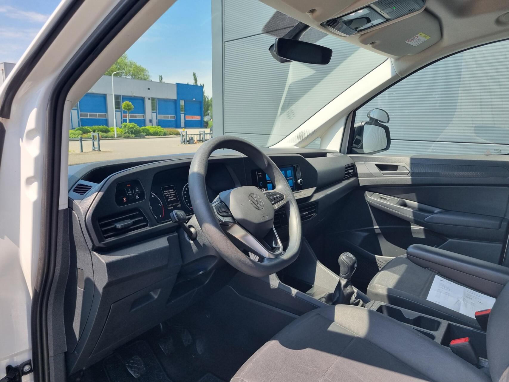 Foto van Volkswagen Caddy Modified Partition Wall