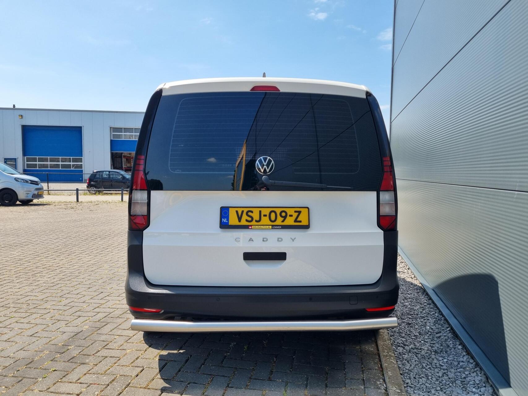 Foto van Volkswagen Caddy Modified Partition Wall