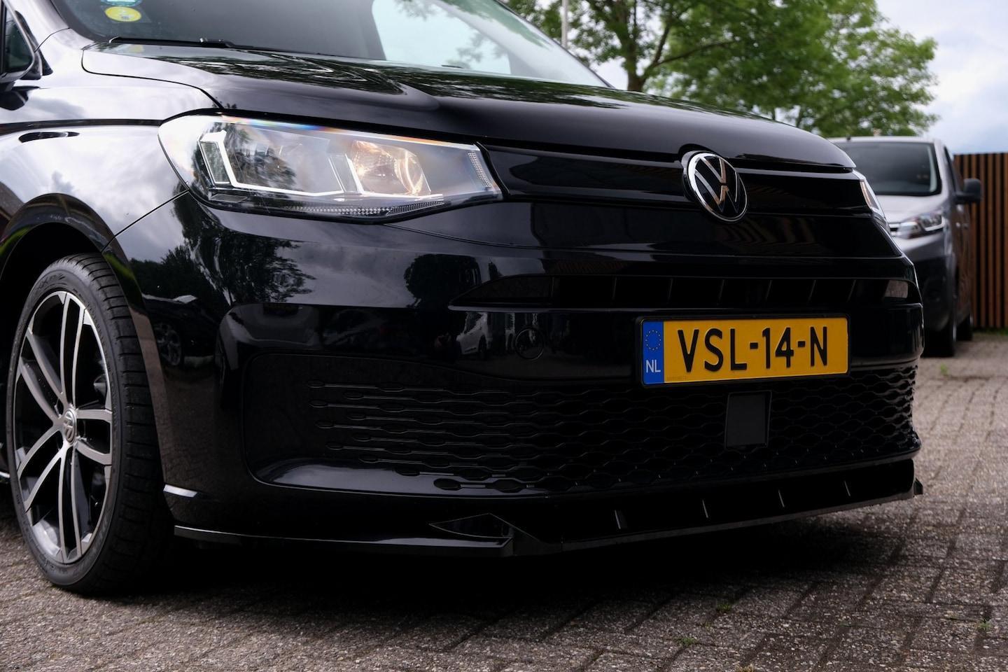 Foto van Volkswagen Caddy Modified Partition Wall