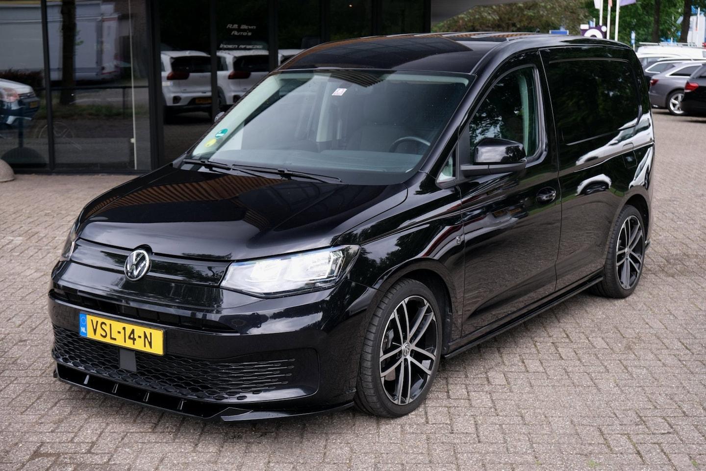 Foto van Volkswagen Caddy Modified Partition Wall