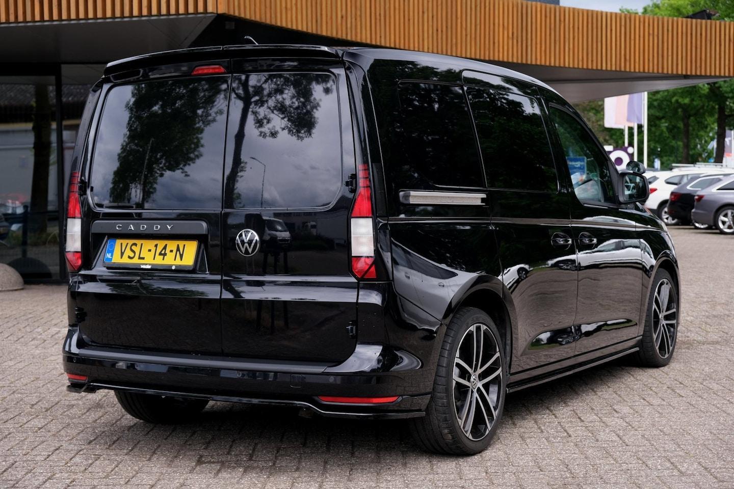 Foto van Volkswagen Caddy Modified Partition Wall