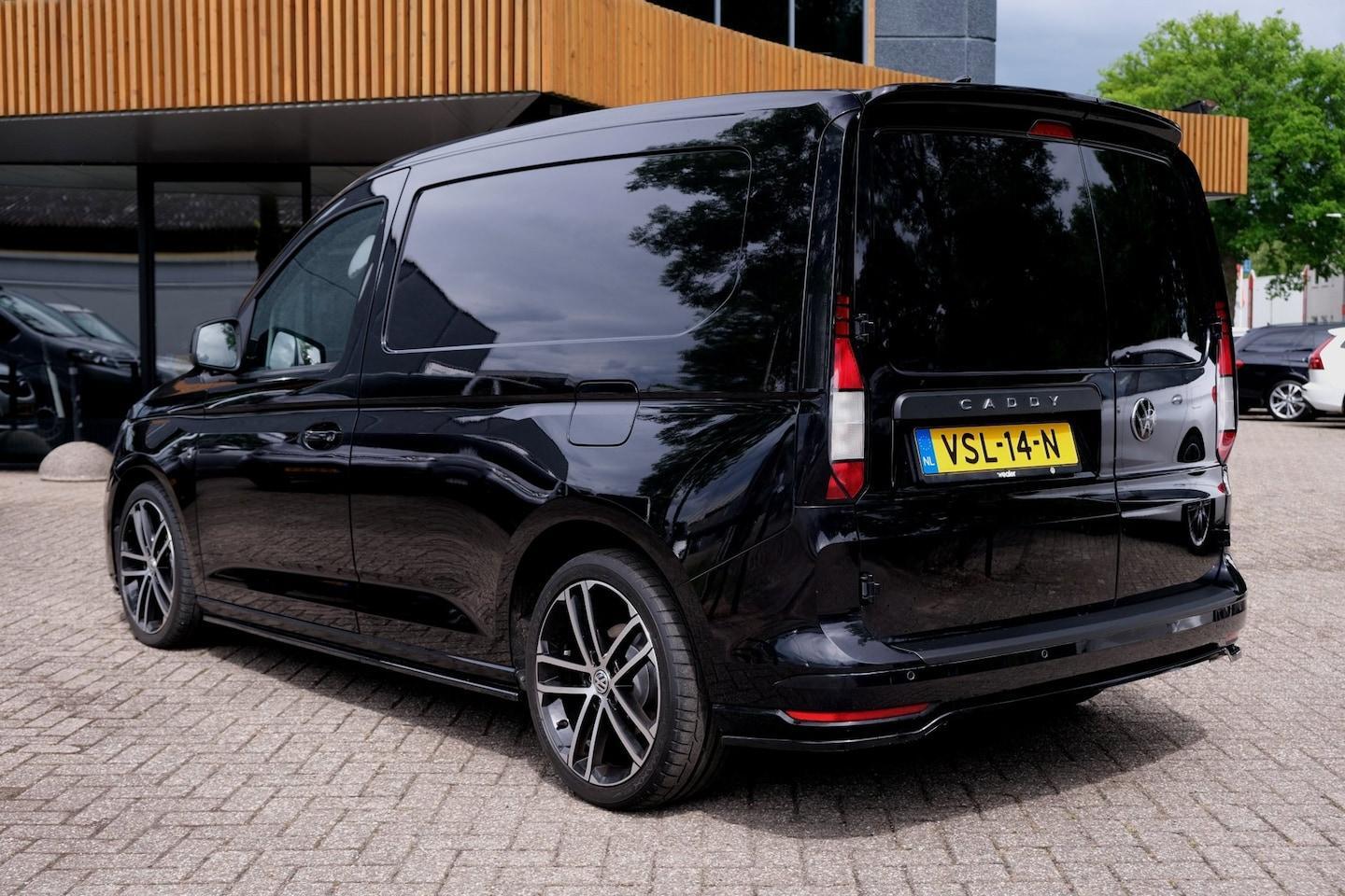 Foto van Volkswagen Caddy Modified Partition Wall