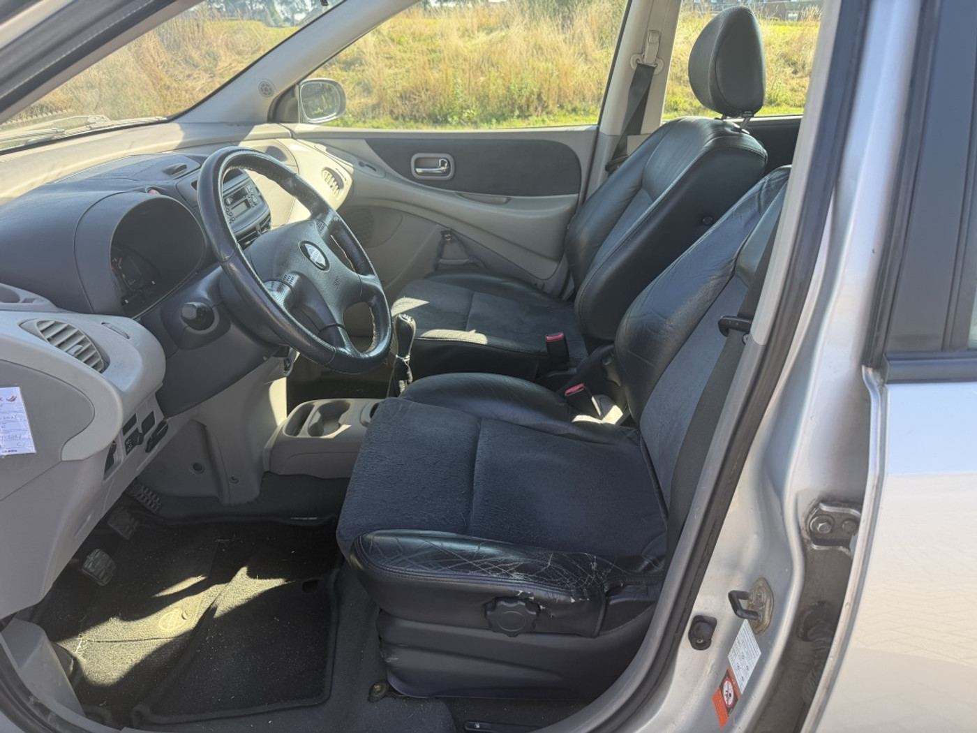 Foto van Nissan Nissan Almera Tino