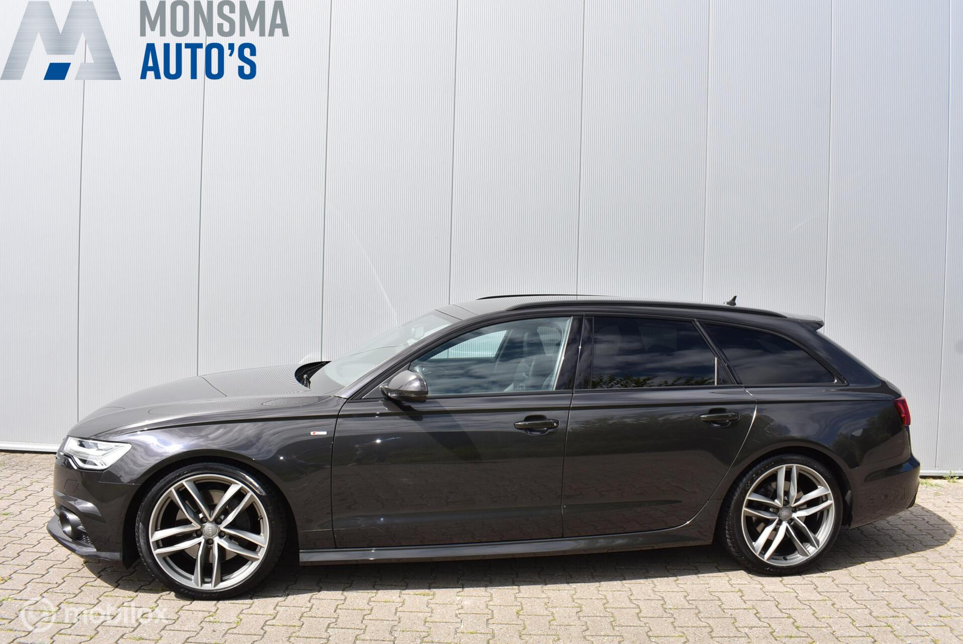 Audi A6 Avant 3.0 TFSI q. MTM 440pk Oolonggrau RS-stoelen ACC Bose Leder 20" LMV Trekhaak *Zr Mooi! 2015 - voorkant