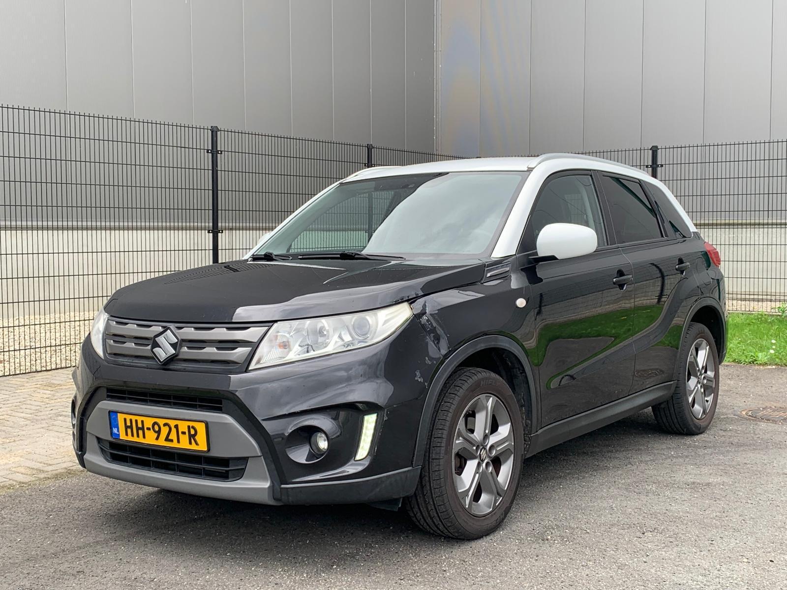 Suzuki Vitara 1.6 Exclusive|LICHTE SCHADE|TREKHAAK|NAVI 2015 - voorkant