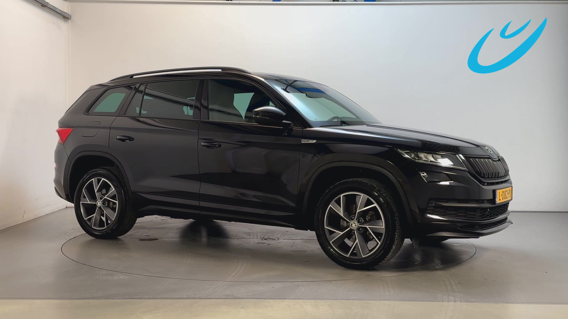 Skoda Kodiaq 1.5 TSI 150pk DSG Sportline Business Alcantara Stoelverwarming Trekhaak Camera Stoelverwarming 2021 - voorkant