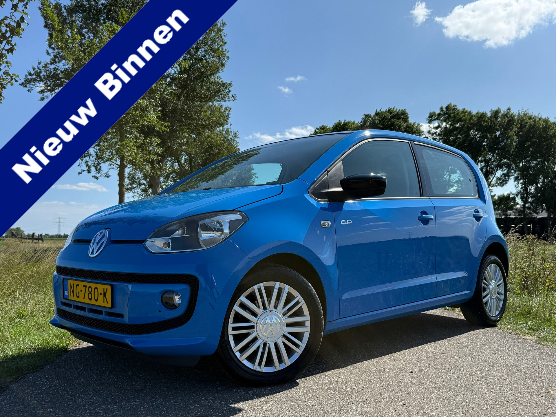 Volkswagen Up 1.0 high up! BlueMotion | Navi | Stoelverwarming | 2e Eigenaar | Airco | 15" Velgen | Elektrisch pakket | 2014 - voorkant