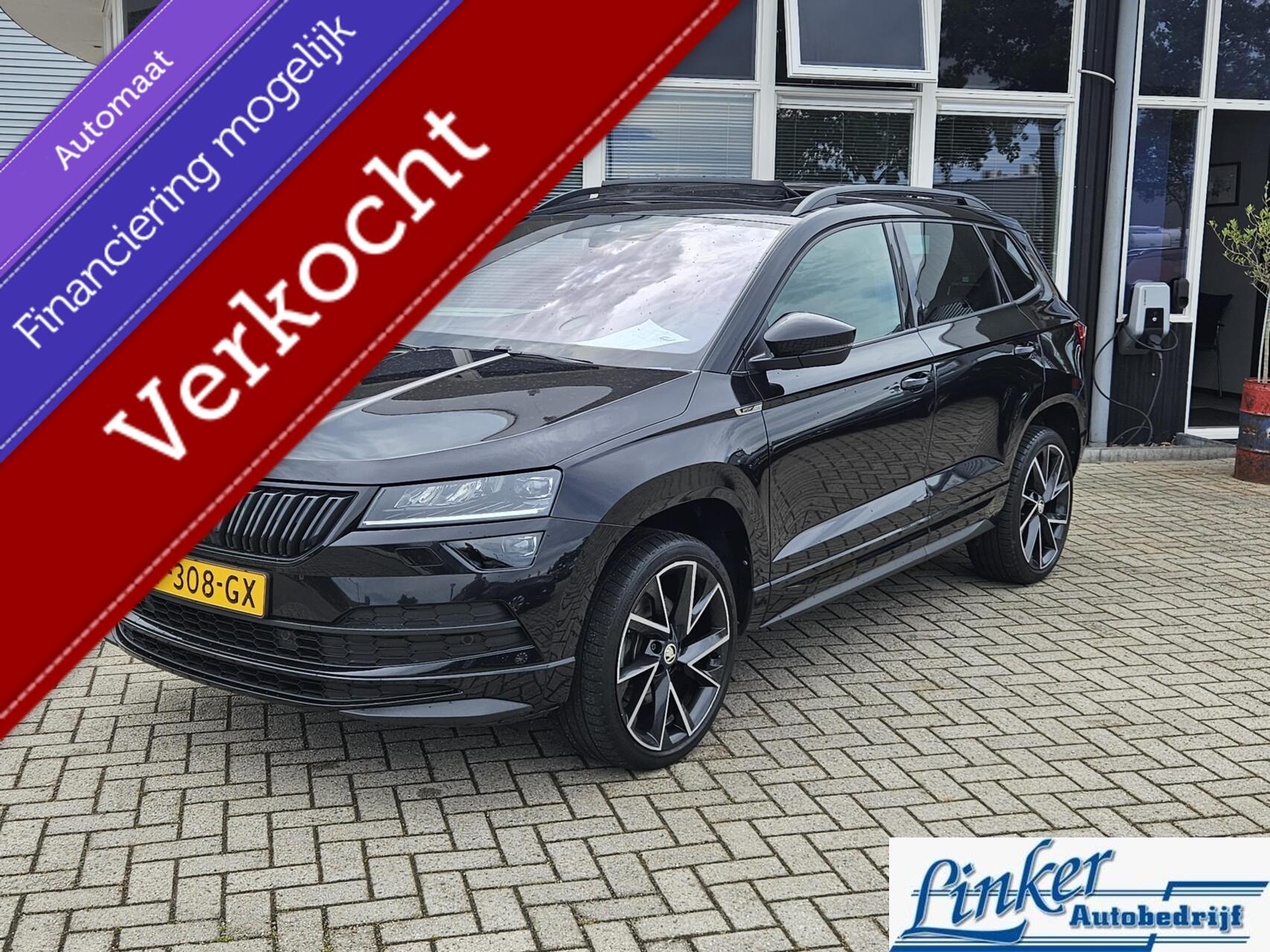Skoda Karoq 1.5 TSI ACT Sportline Business -PANO TREKHAAK NL-AUTO CAMERA PDC 2022 - voorkant