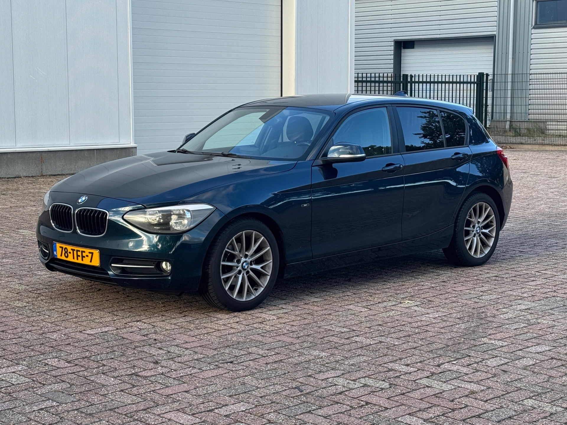 BMW 1er Reihe 116i Business+ Sport 2012 - voorkant