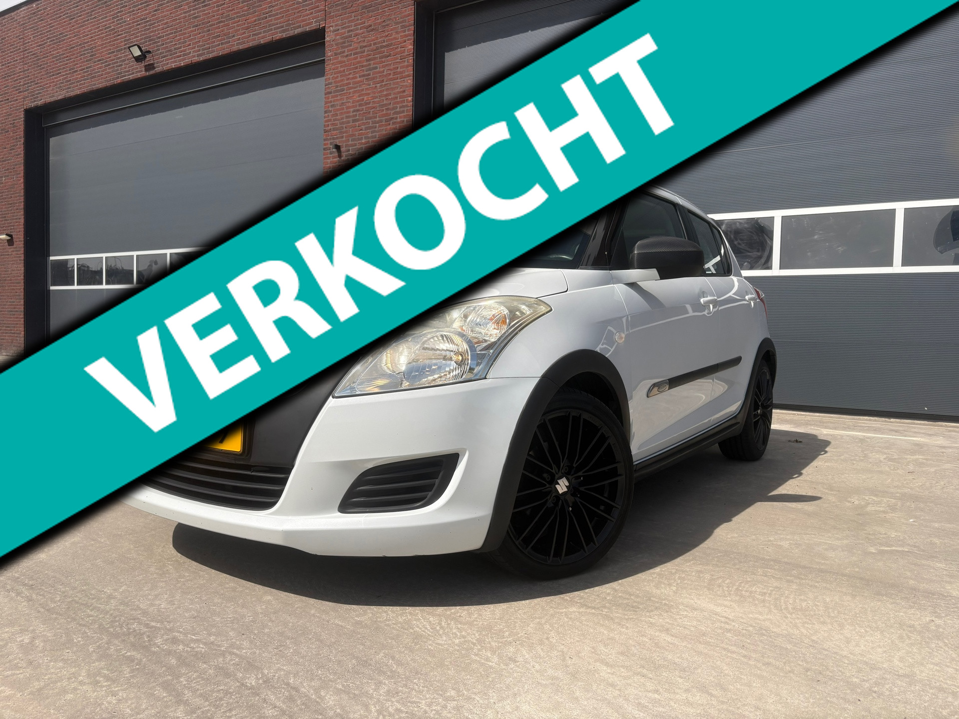 Suzuki Swift 1.2 Bandit EASSS Airco 17inch 4deurs parelmoer wit isofix 2012 - voorkant