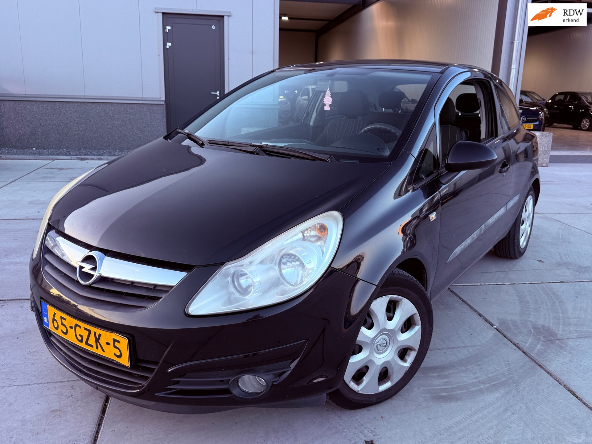 Opel Corsa 1.4-16V Enjoy cruis airco 2008 - voorkant