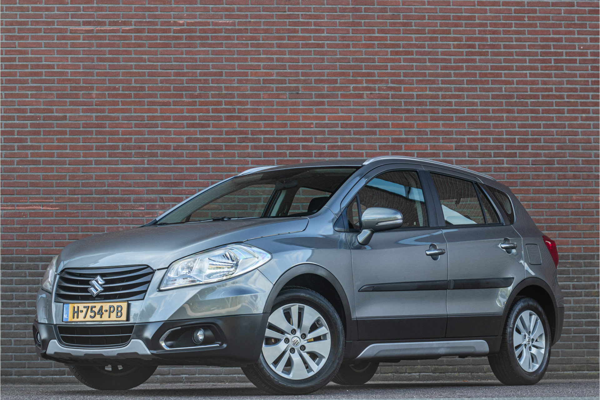 Suzuki Sx4 1.6 Automaat Comfort, Stoelverwarming, Trekhaak, Bluetooth, PDC, Keyless, Climate control. 2014 - voorkant